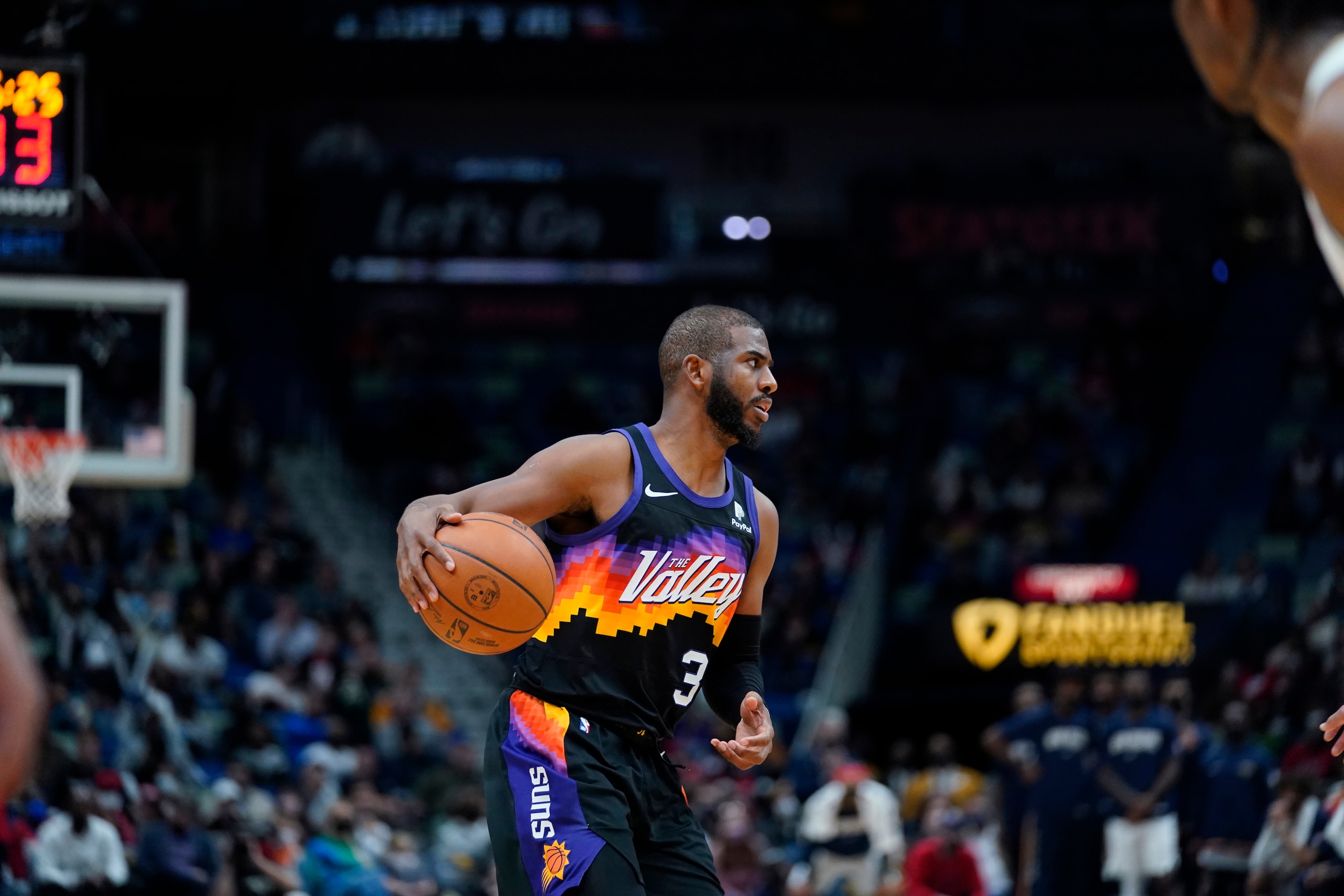 Phoenix Suns guard Chris Paul (3) moves the ball down court in the second half of an NBA basketball game against the New Orleans Pelicans in New Orleans, Tuesday, Jan. 4, 2022. The Suns won 123-110. (AP Photo/Gerald Herbert)