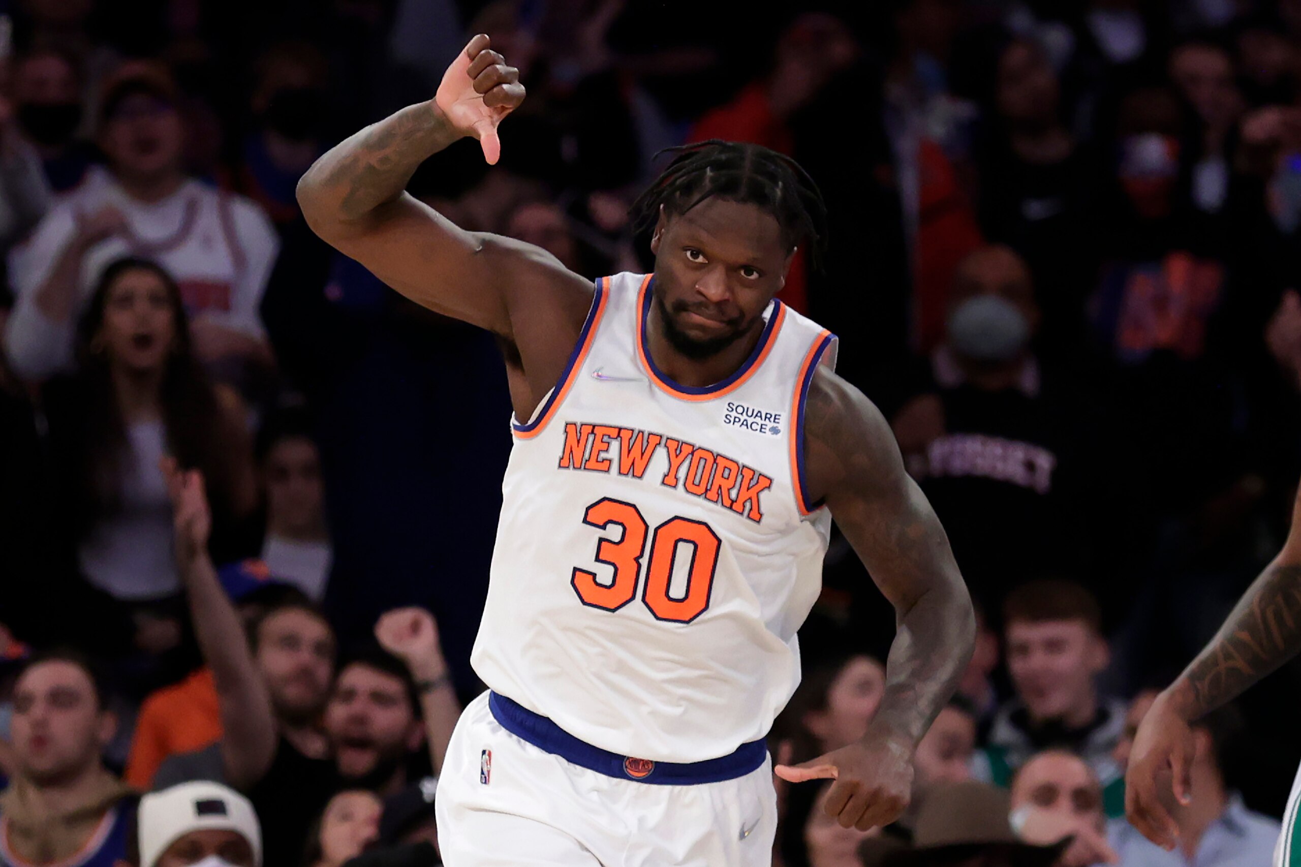 New York Knicks forward Julius Randle (30) reacts against the Boston Celtics during the second half of an NBA basketball game Thursday, Jan. 6, 2022, in New York. The Knicks won 108-105. (AP Photo/Adam Hunger) New York Knicks forward Julius Randle (30) reacts against the Boston Celtics during the second half of an NBA basketball game Thursday, Jan. 6, 2022, in New York. The Knicks won 108-105. (AP Photo/Adam Hunger)