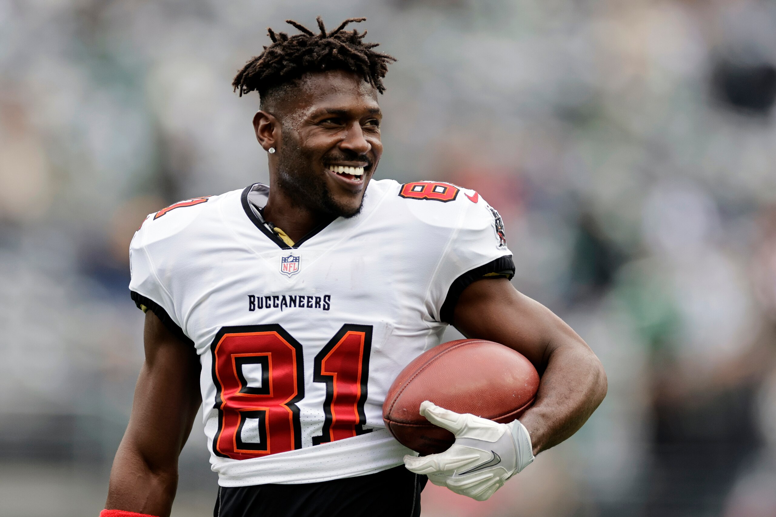 Tampa Bay Buccaneers wide receiver Antonio Brown (81) walks on the field during an NFL football game against the New York Jets, Sunday, Jan. 2, 2022, in East Rutherford, N.J. (AP Photo/Adam Hunger) Tampa Bay Buccaneers wide receiver Antonio Brown (81) walks on the field during an NFL football game against the New York Jets, Sunday, Jan. 2, 2022, in East Rutherford, N.J. (AP Photo/Adam Hunger)