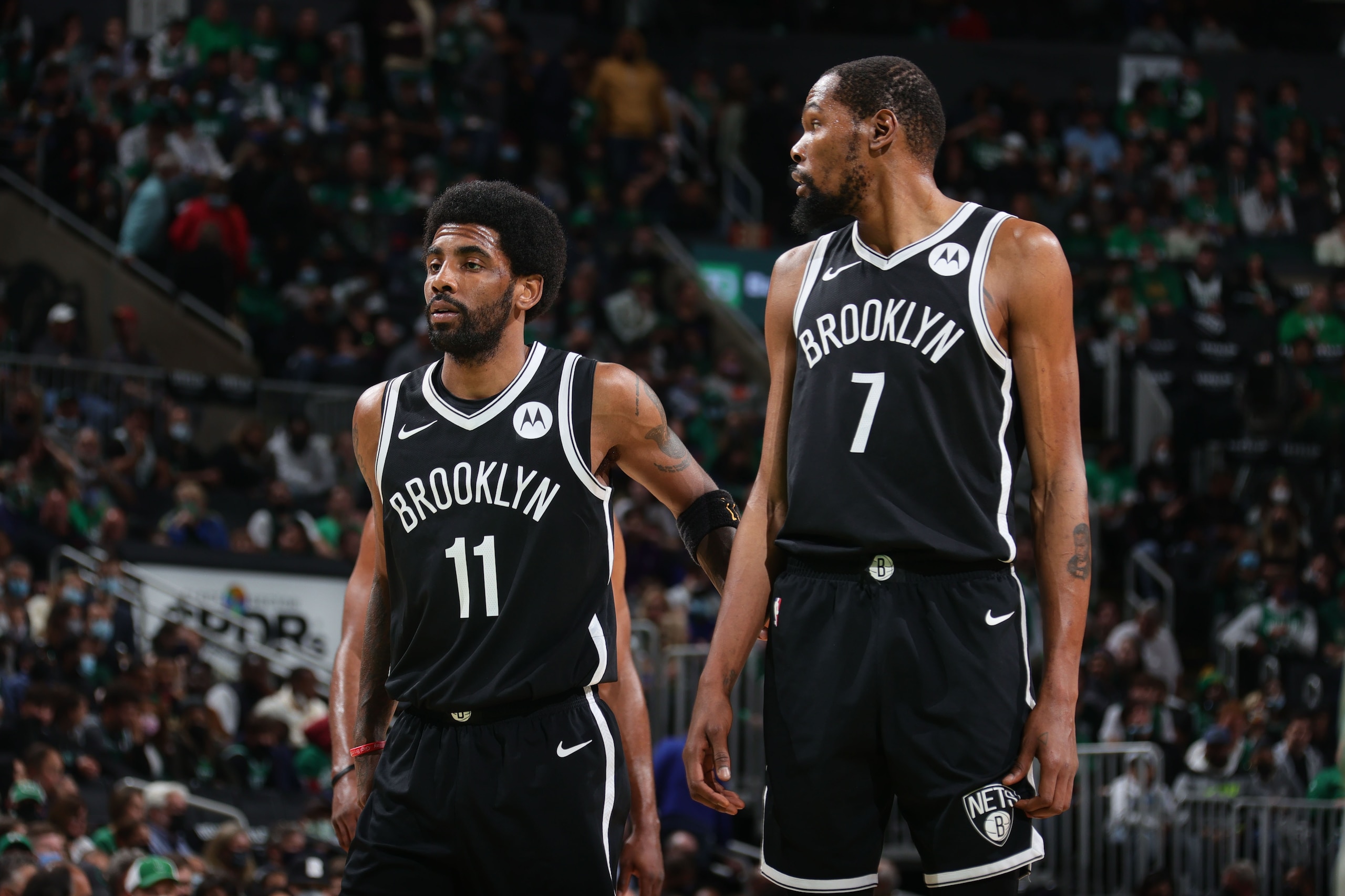BOSTON, MA - MAY 30: Kyrie Irving #11 and Kevin Durant #7 of the Brooklyn Nets look on during the game against the Boston Celtics during Round 1, Game 4 of the 2021 NBA Playoffs on May 30, 2021 at the TD Garden in Boston, Massachusetts.  NOTE TO USER: User expressly acknowledges and agrees that, by downloading and or using this photograph, User is consenting to the terms and conditions of the Getty Images License Agreement. Mandatory Copyright Notice: Copyright 2021 NBAE  (Photo by Nathaniel S. Butler/NBAE via Getty Images)
