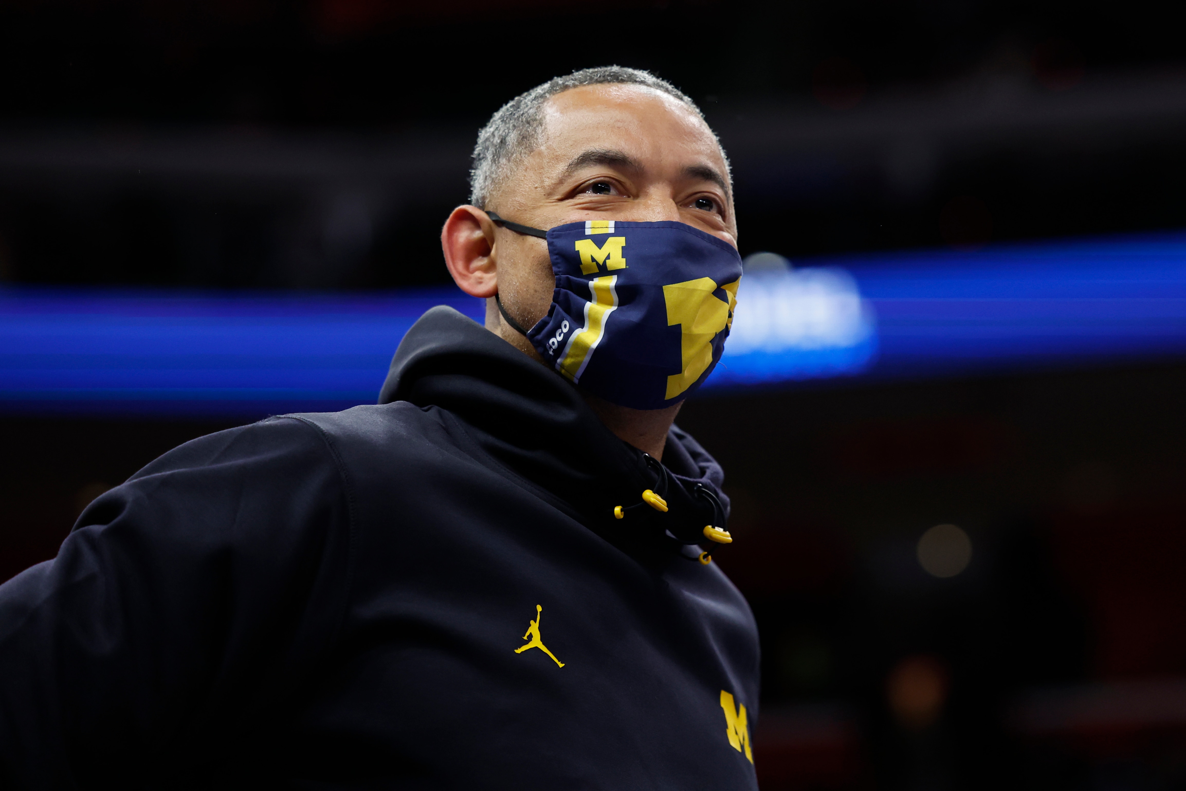 DETROIT, MICHIGAN - DECEMBER 19: Michigan head coach Juwan Howard watches the game between the Detroit Pistons and the Miami Heat at Little Caesars Arena on December 19, 2021 in Detroit, Michigan. NOTE TO USER: User expressly acknowledges and agrees that, by downloading and or using this photograph, User is consenting to the terms and conditions of the Getty Images License Agreement. (Photo by Rick Osentoski/Getty Images) DETROIT, MICHIGAN - DECEMBER 19: Michigan head coach Juwan Howard watches the game between the Detroit Pistons and the Miami Heat at Little Caesars Arena on December 19, 2021 in Detroit, Michigan. NOTE TO USER: User expressly acknowledges and agrees that, by downloading and or using this photograph, User is consenting to the terms and conditions of the Getty Images License Agreement. (Photo by Rick Osentoski/Getty Images)