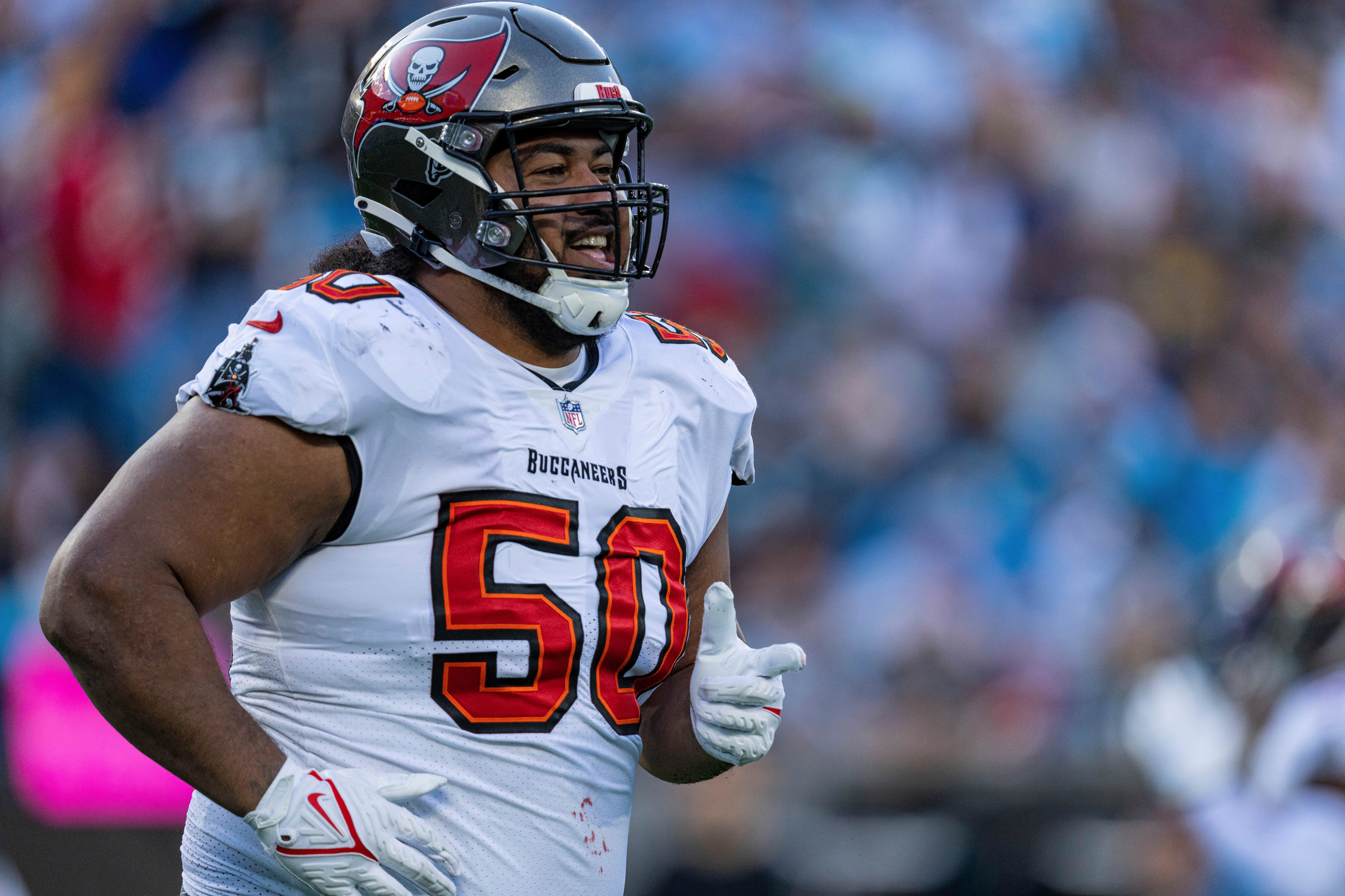 Tampa Bay Buccaneers nose tackle Vita Vea celebrates after sacking Carolina Panthers quarterback Cam Newton during the second half of an NFL football game Sunday, Dec. 26, 2021, in Charlotte, N.C. (AP Photo/Jacob Kupferman)