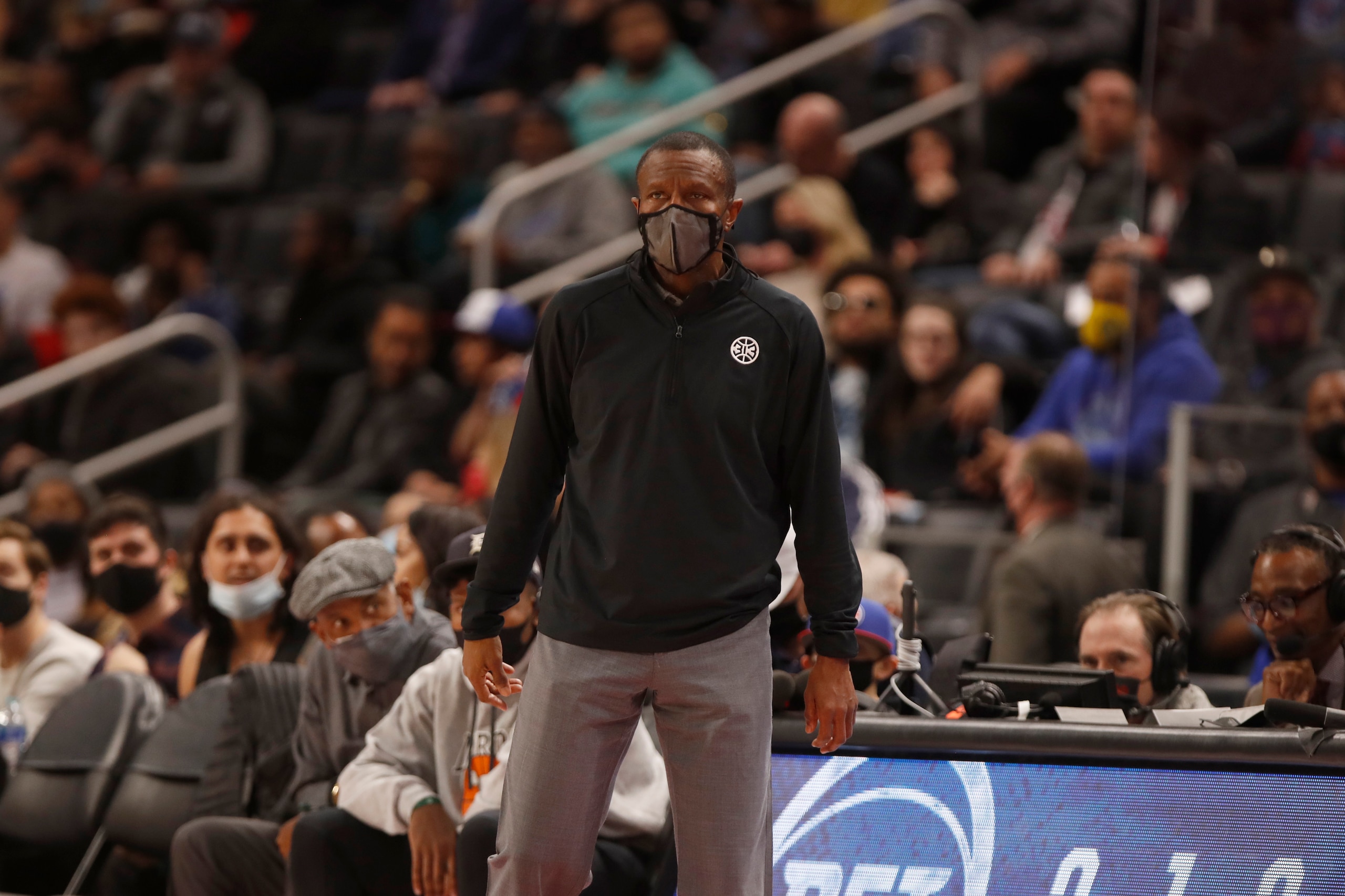 DETROIT, MI - DECEMBER 29: Head Coach Dwane Casey of the Detroit Pistons looks on during the game against the New York Knicks on December 29, 2021 at Little Caesars Arena in Detroit, Michigan. NOTE TO USER: User expressly acknowledges and agrees that, by downloading and/or using this photograph, User is consenting to the terms and conditions of the Getty Images License Agreement. Mandatory Copyright Notice: Copyright 2021 NBAE (Photo by Brian Sevald/NBAE via Getty Images)