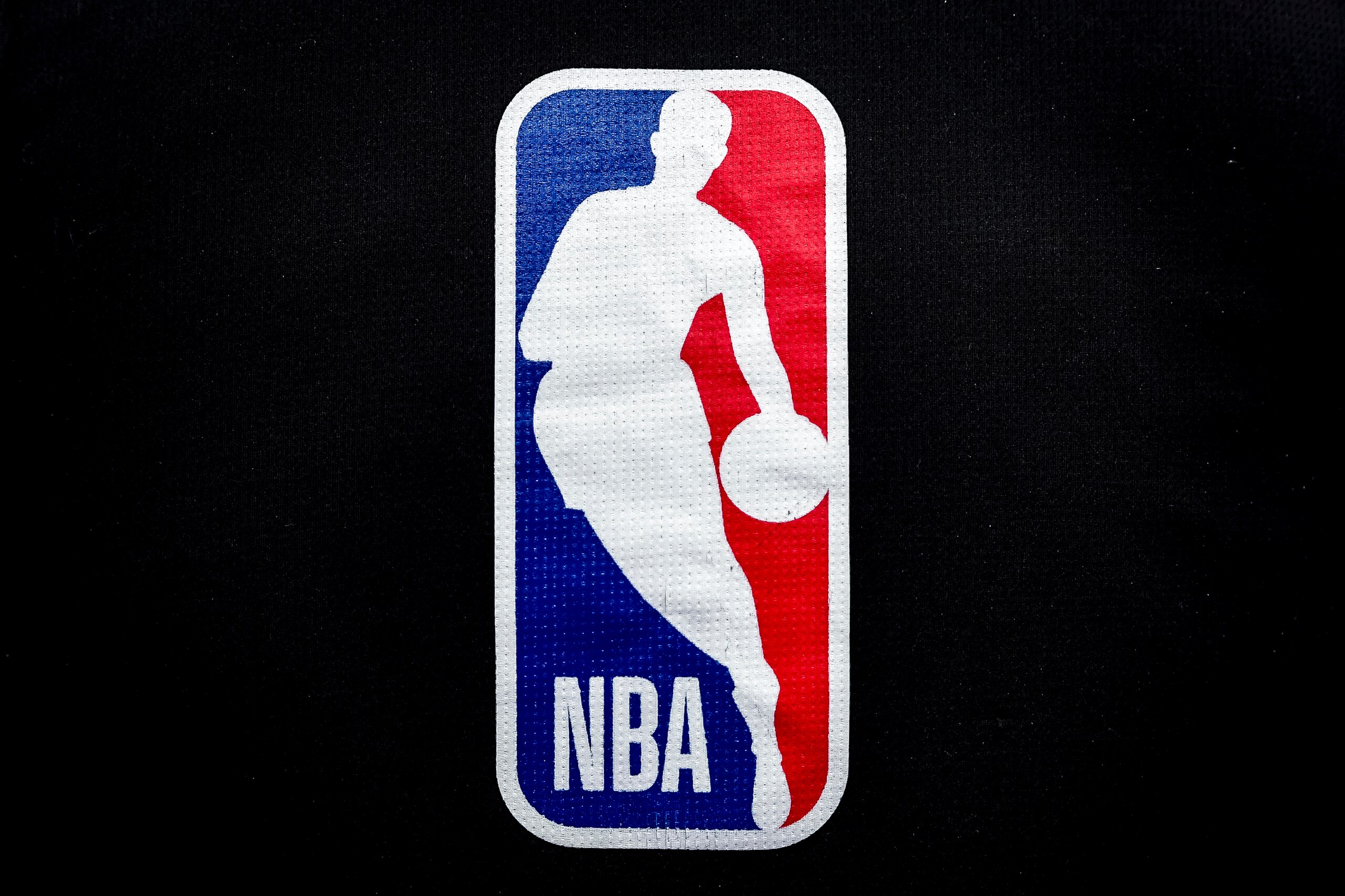 DETROIT, MICHIGAN - JANUARY 08: The NBA logo is pictured ahead of the game between the Detroit Pistons and Orlando Magic at Little Caesars Arena on January 08, 2022 in Detroit, Michigan. NOTE TO USER: User expressly acknowledges and agrees that, by downloading and or using this photograph, User is consenting to the terms and conditions of the Getty Images License Agreement. (Photo by Nic Antaya/Getty Images)