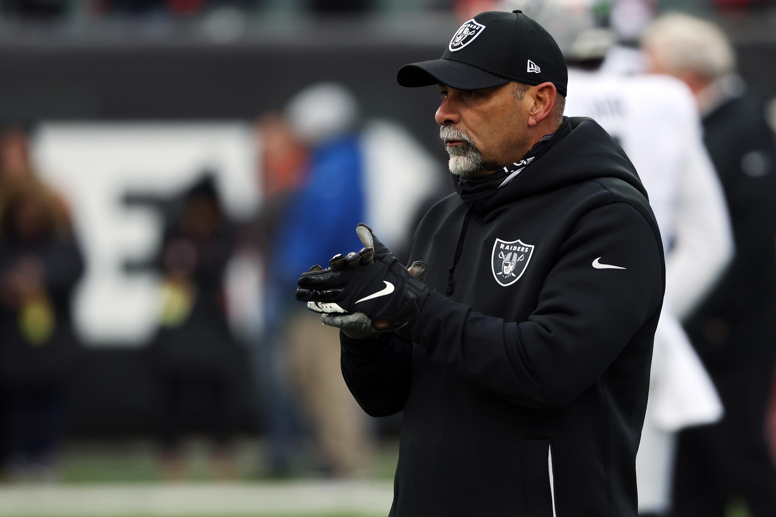 CINCINNATI, OHIO - JANUARY 15: Interim Head Coach/Special Teams Coordinator Rich Bisaccia of the Las Vegas Raiders looks on before the start of the AFC Wild Card playoff game against the Cincinnati Bengals at Paul Brown Stadium on January 15, 2022 in Cincinnati, Ohio. (Photo by Dylan Buell/Getty Images)
