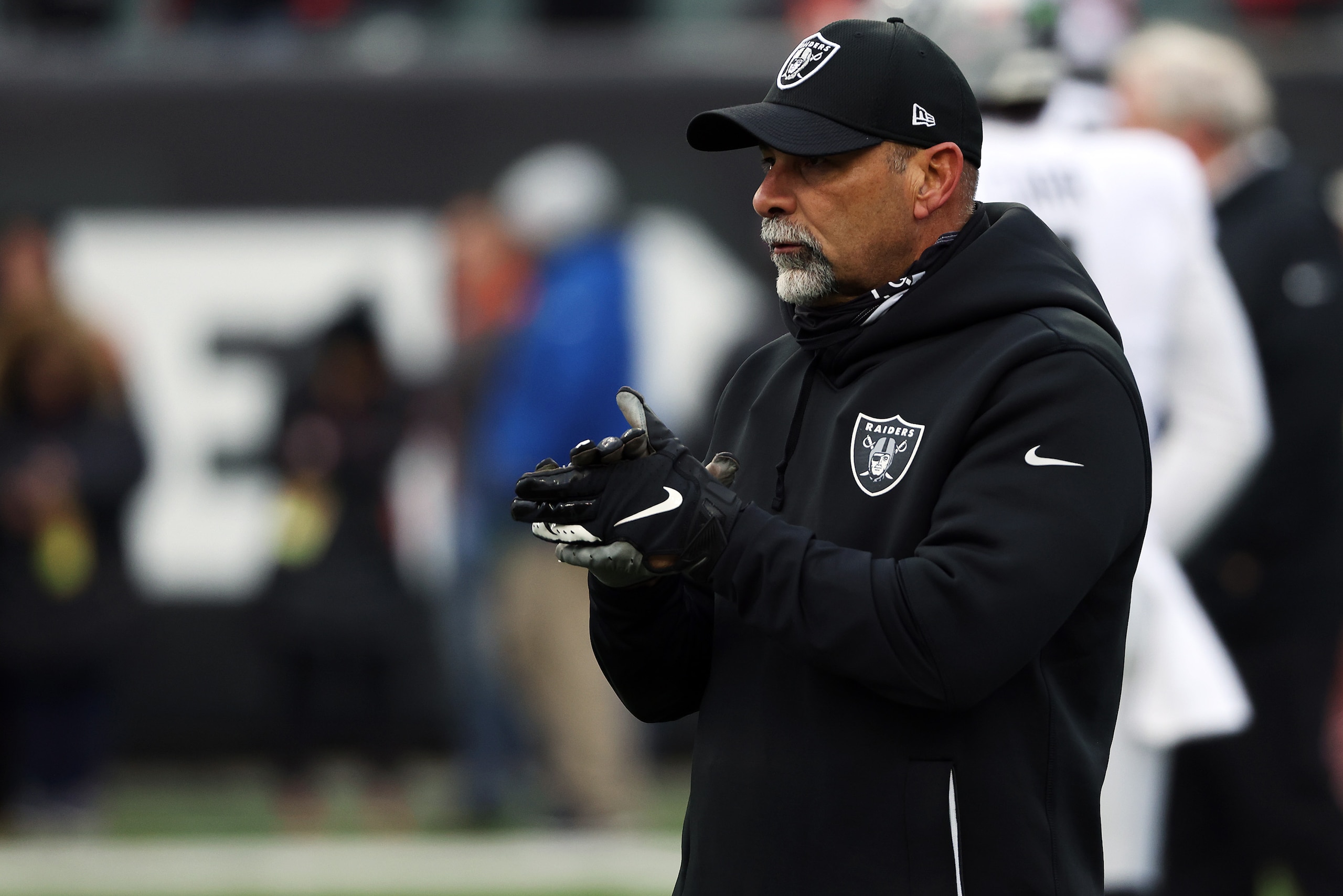 CINCINNATI, OHIO - JANUARY 15: Interim Head Coach/Special Teams Coordinator Rich Bisaccia of the Las Vegas Raiders looks on before the start of the AFC Wild Card playoff game against the Cincinnati Bengals at Paul Brown Stadium on January 15, 2022 in Cincinnati, Ohio. (Photo by Dylan Buell/Getty Images)