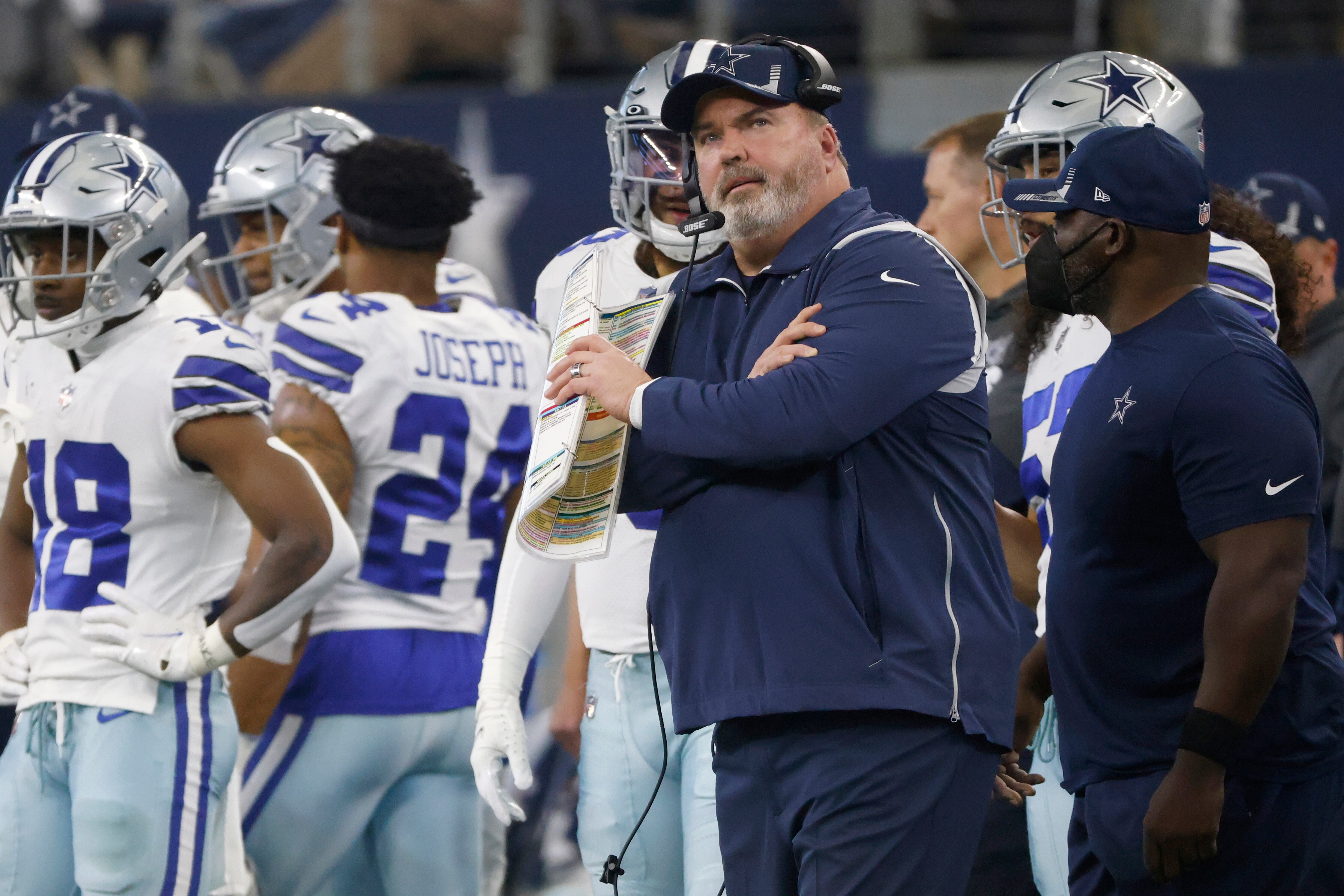 Dallas Cowboys head coach Mike McCarthy watches during the first half of his team's NFL wild-card playoff football game against the San Francisco 49ers in Arlington, Texas, Sunday, Jan. 16, 2022. (AP Photo/Ron Jenkins)