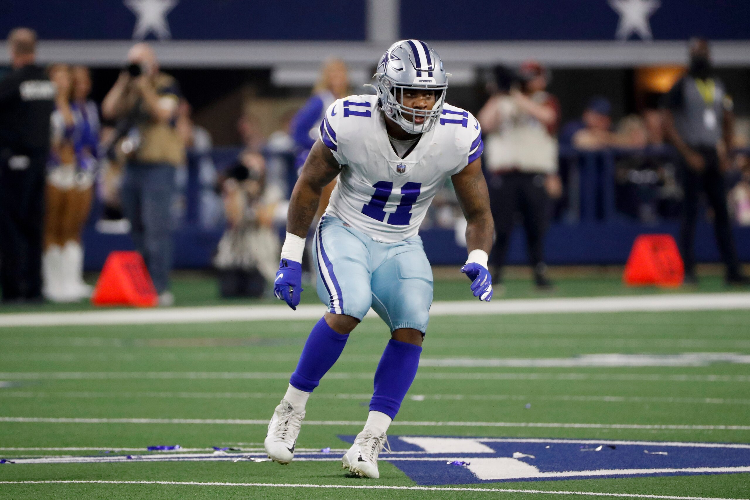 Dallas Cowboys linebacker Micah Parsons tracks the play during the first half of an NFL football game against the Washington Football Team in Arlington, Texas, Sunday, Dec. 26, 2021. (AP Photo/Roger Steinman)