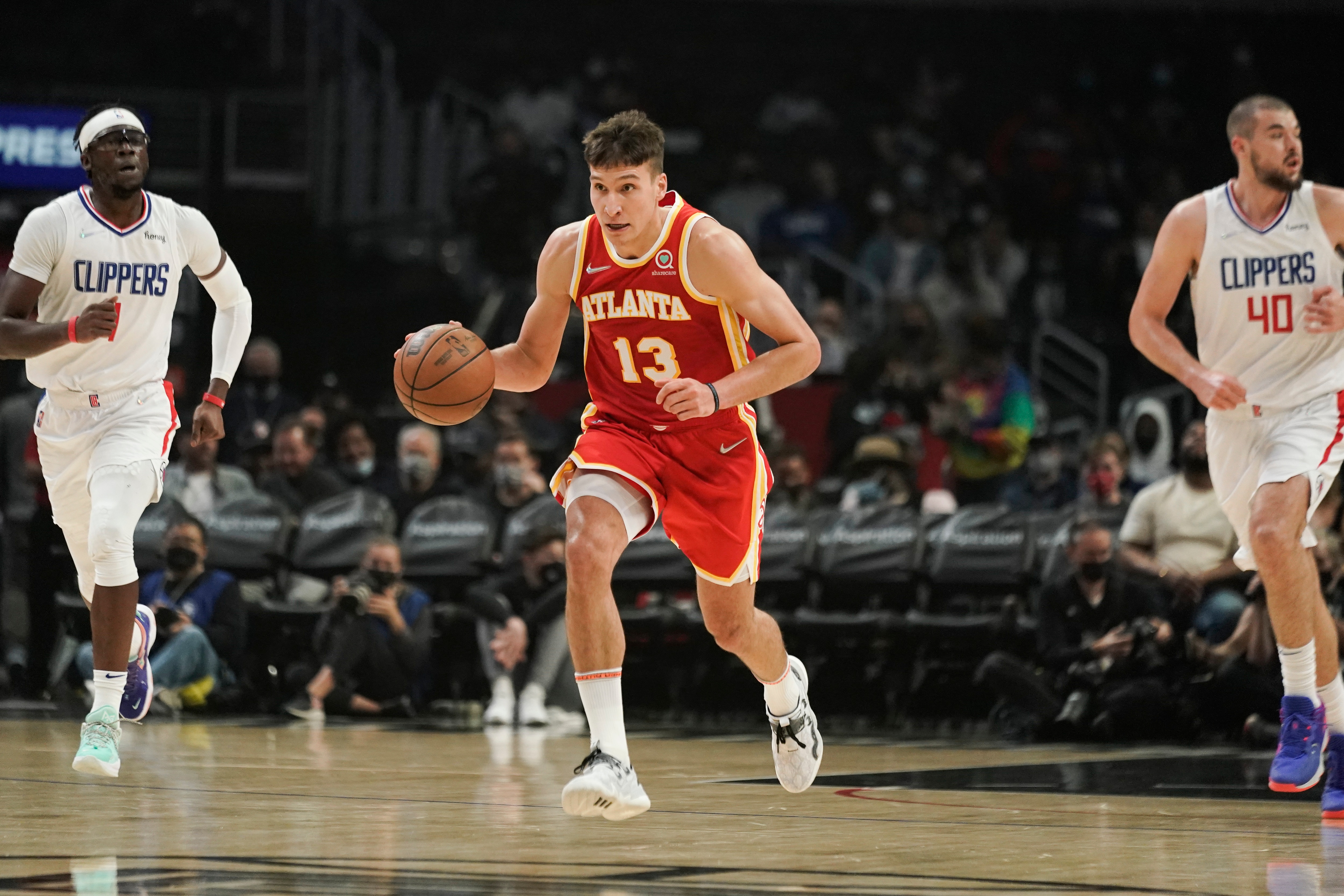 Atlanta Hawks' Bogdan Bogdanovic makes his way down the court during first half of an NBA basketball game against the Los Angeles Clippers Sunday, Jan. 9, 2022, in Los Angeles. (AP Photo/Jae C. Hong)