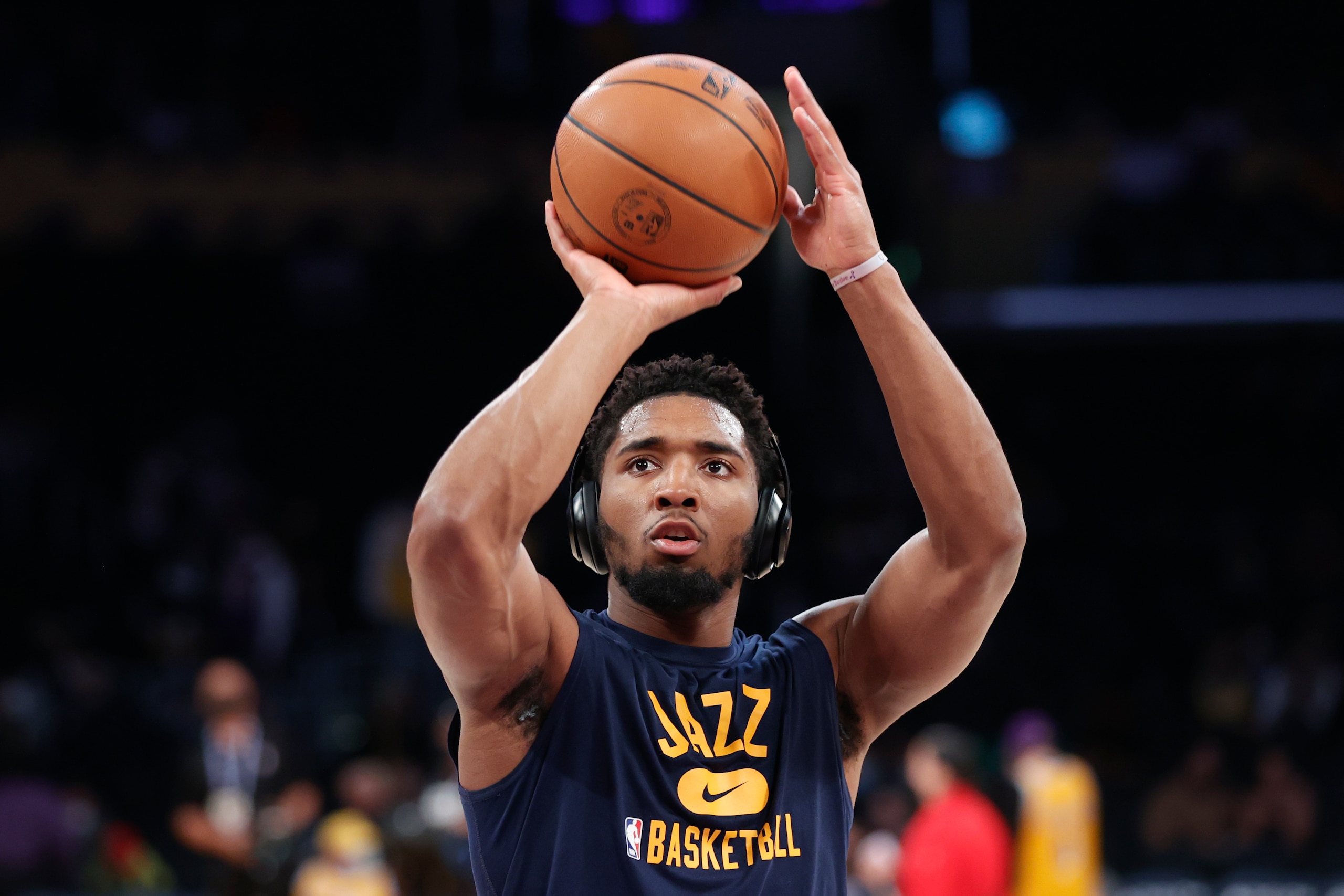 Utah Jazz guard Donovan Mitchell (45) warms up before an NBA basketball game against the Los Angeles Lakers in Los Angeles, Monday, Jan. 17, 2022. (AP Photo/Ringo H.W. Chiu)