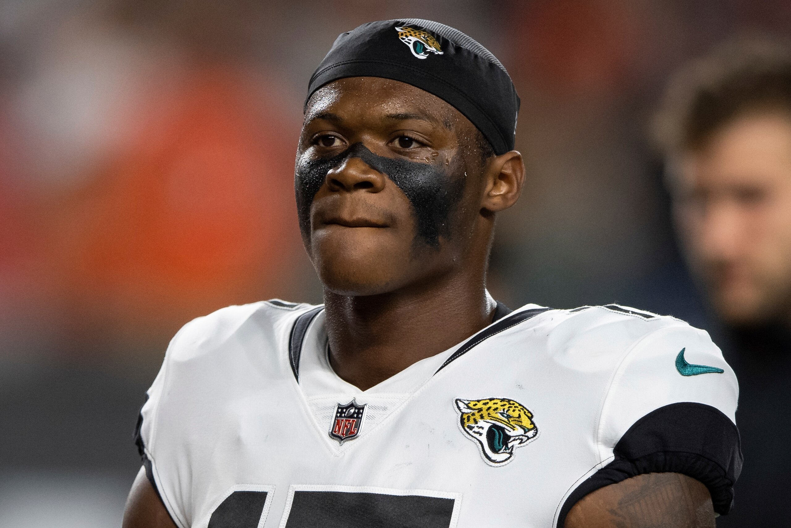 Jacksonville Jaguars wide receiver DJ Chark Jr. (17) warms up on the field before an NFL football game against the Cincinnati Bengals, Thursday, Sept. 30, 2021, in Cincinnati. (AP Photo/Zach Bolinger)