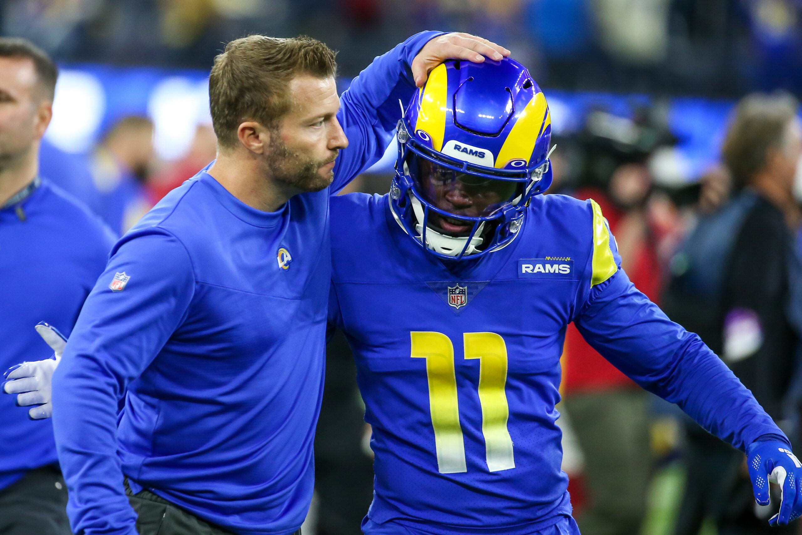 INGLEWOOD, CA - JANUARY 17: Los Angeles Rams head coach Sean McVay gives tap on the helmet of Los Angeles Rams cornerback Darious Williams #11 during the NFC Wild Card playoff game between the Arizona Cardinals and the Los Angeles Rams on January 17, 2022, at SoFi Stadium in Inglewood, CA. (Photo by Jevone Moore/Icon Sportswire via Getty Images)