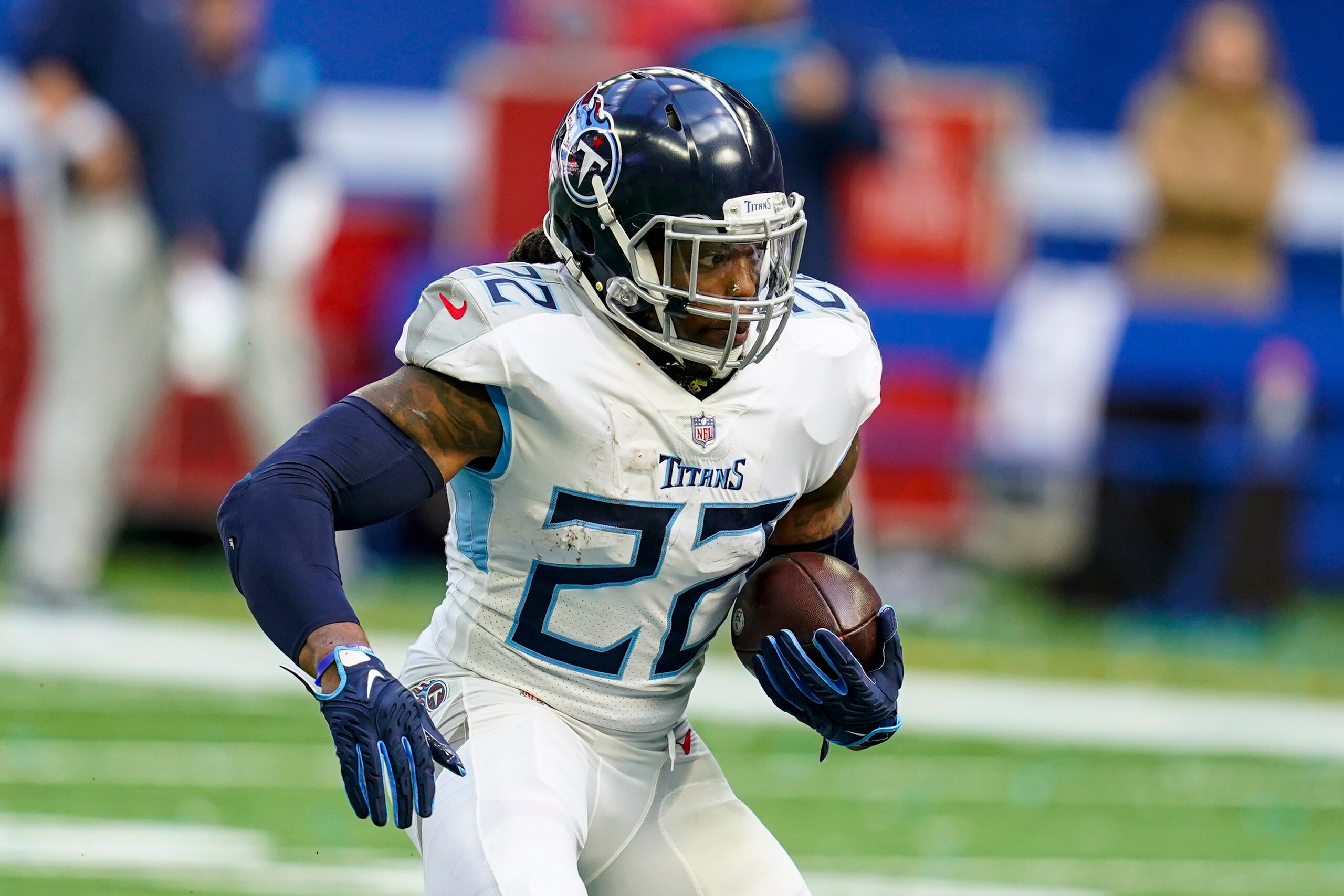 Tennessee Titans running back Derrick Henry (22) runs against the Indianapolis Colts in the second half of an NFL football game in Indianapolis, Sunday, Oct. 31, 2021. (AP Photo/Darron Cummings)