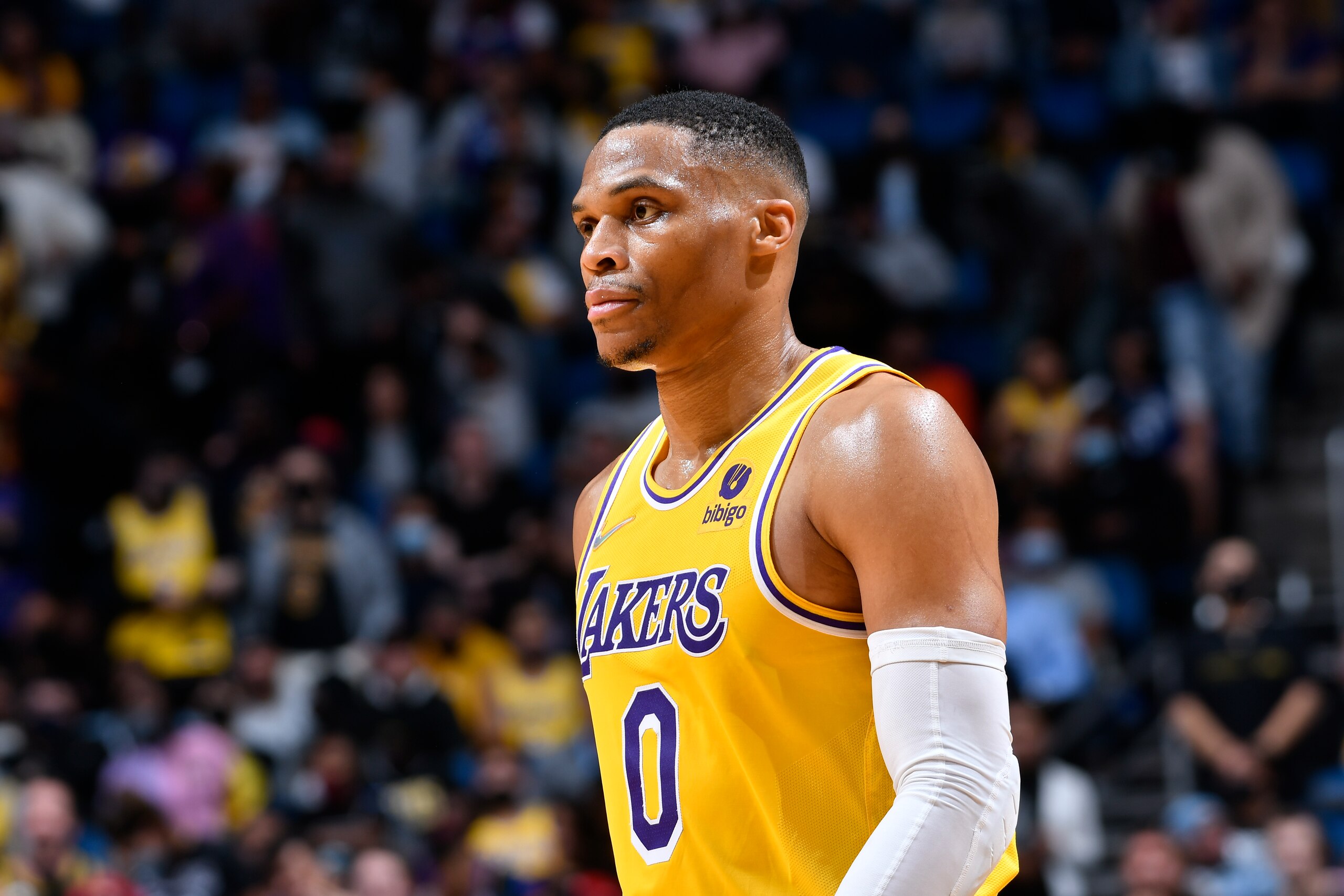ORLANDO, FL - JANUARY 21: Russell Westbrook #0 of the Los Angeles Lakers looks on during the game against the Orlando Magic on January 21, 2022 at Amway Center in Orlando, Florida. NOTE TO USER: User expressly acknowledges and agrees that, by downloading and or using this photograph, User is consenting to the terms and conditions of the Getty Images License Agreement. Mandatory Copyright Notice: Copyright 2022 NBAE (Photo by Fernando Medina/NBAE via Getty Images)