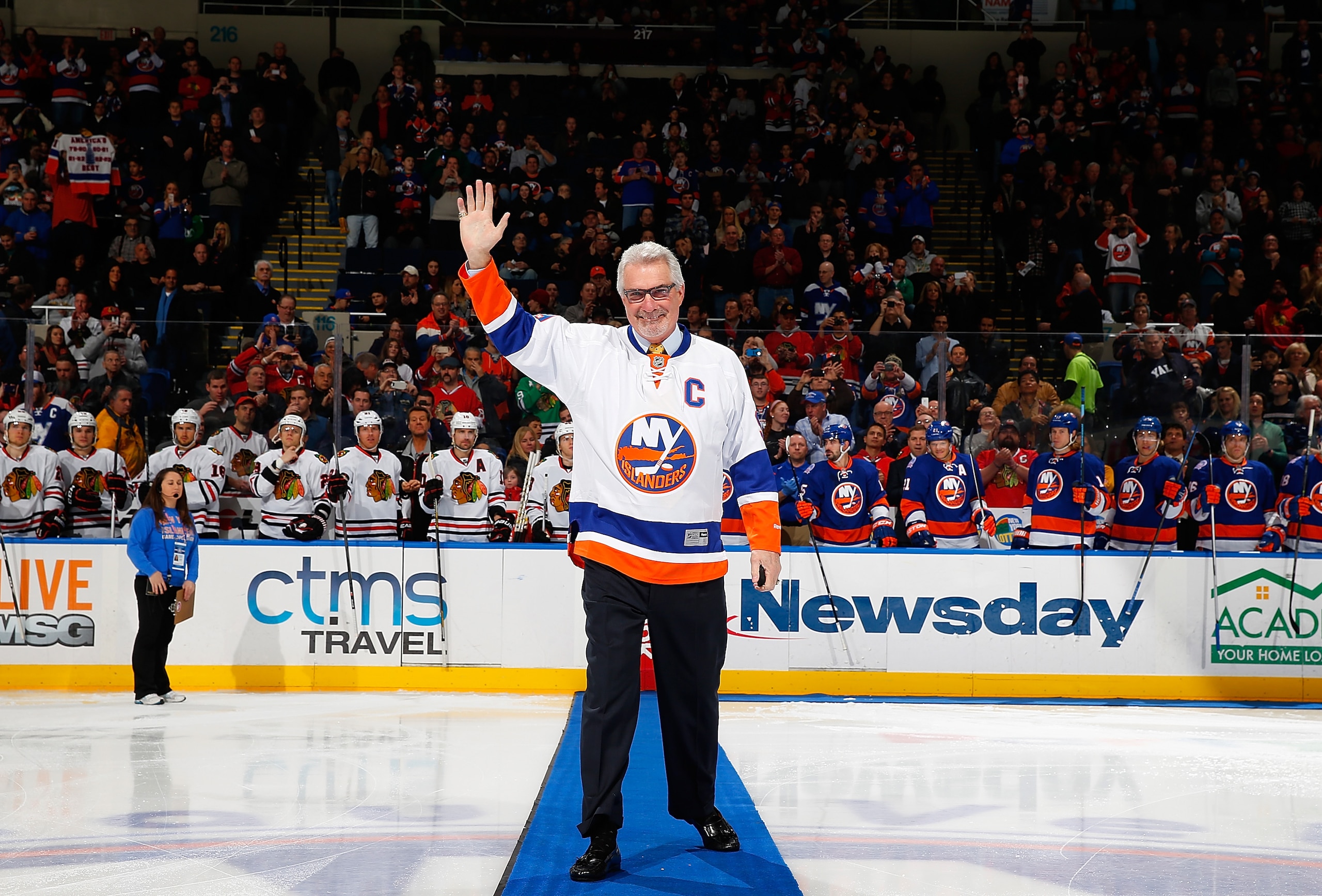 UNIONDALE, NY - DECEMBER 13: NHL Hall of Famer Clark Gillies waves to the crowd prior to a game against the Chicago Blackhawks at Nassau Veterans Memorial Coliseum on December 13, 2014 in Uniondale, New York. The New York Islanders defeated the Chicago Blackhawks 3-2. (Photo by Mike Stobe/NHLI via Getty Images) UNIONDALE, NY - DECEMBER 13: NHL Hall of Famer Clark Gillies waves to the crowd prior to a game against the Chicago Blackhawks at Nassau Veterans Memorial Coliseum on December 13, 2014 in Uniondale, New York. The New York Islanders defeated the Chicago Blackhawks 3-2. (Photo by Mike Stobe/NHLI via Getty Images)