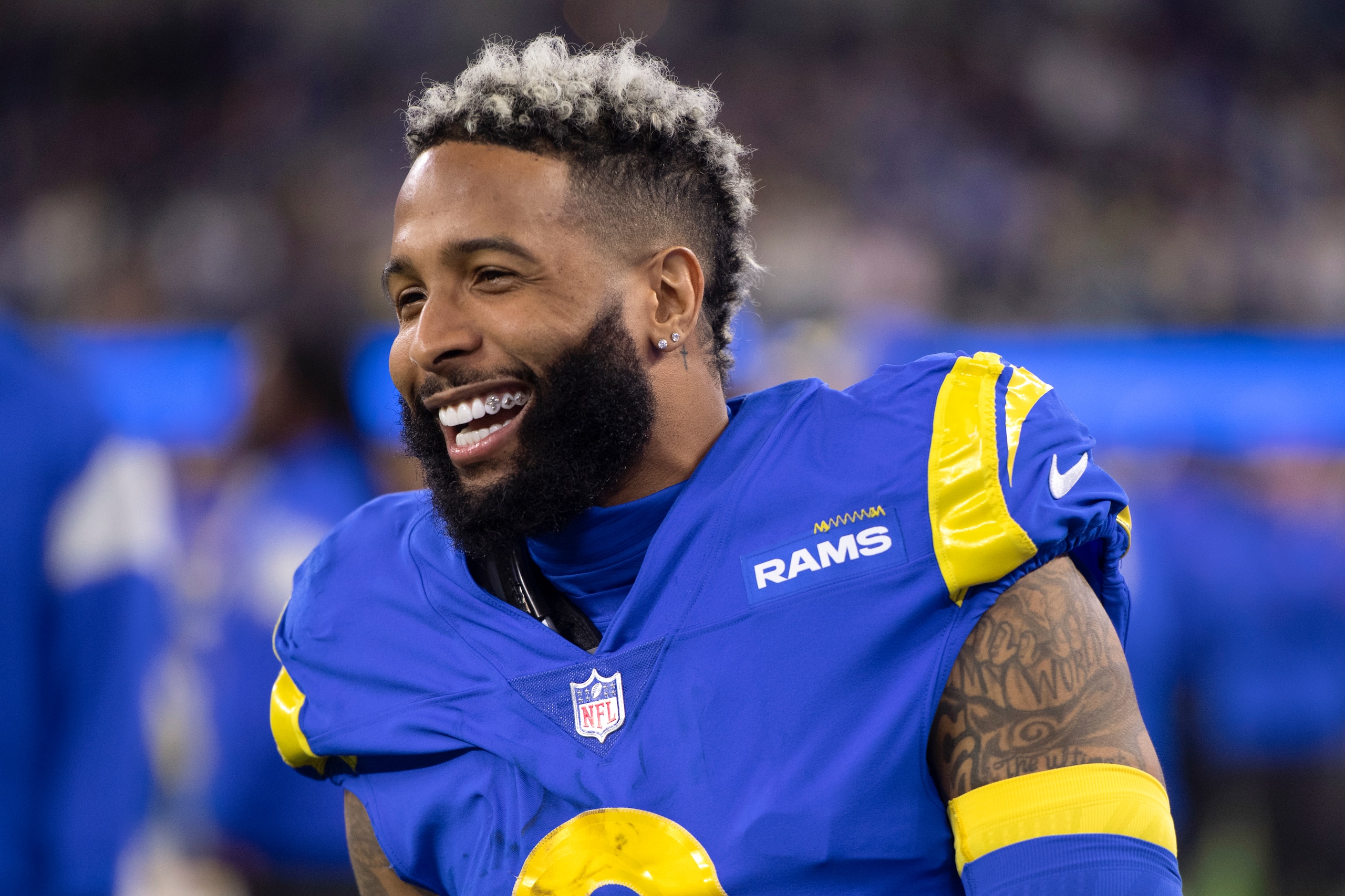 Los Angeles Rams wide receiver Odell Beckham Jr. (3) smiles during an NFL wild-card playoff football game against the Arizona Cardinals Monday, Jan. 17, 2022, in Inglewood, Calif. (AP Photo/Kyusung Gong) Los Angeles Rams wide receiver Odell Beckham Jr. (3) smiles during an NFL wild-card playoff football game against the Arizona Cardinals Monday, Jan. 17, 2022, in Inglewood, Calif. (AP Photo/Kyusung Gong)