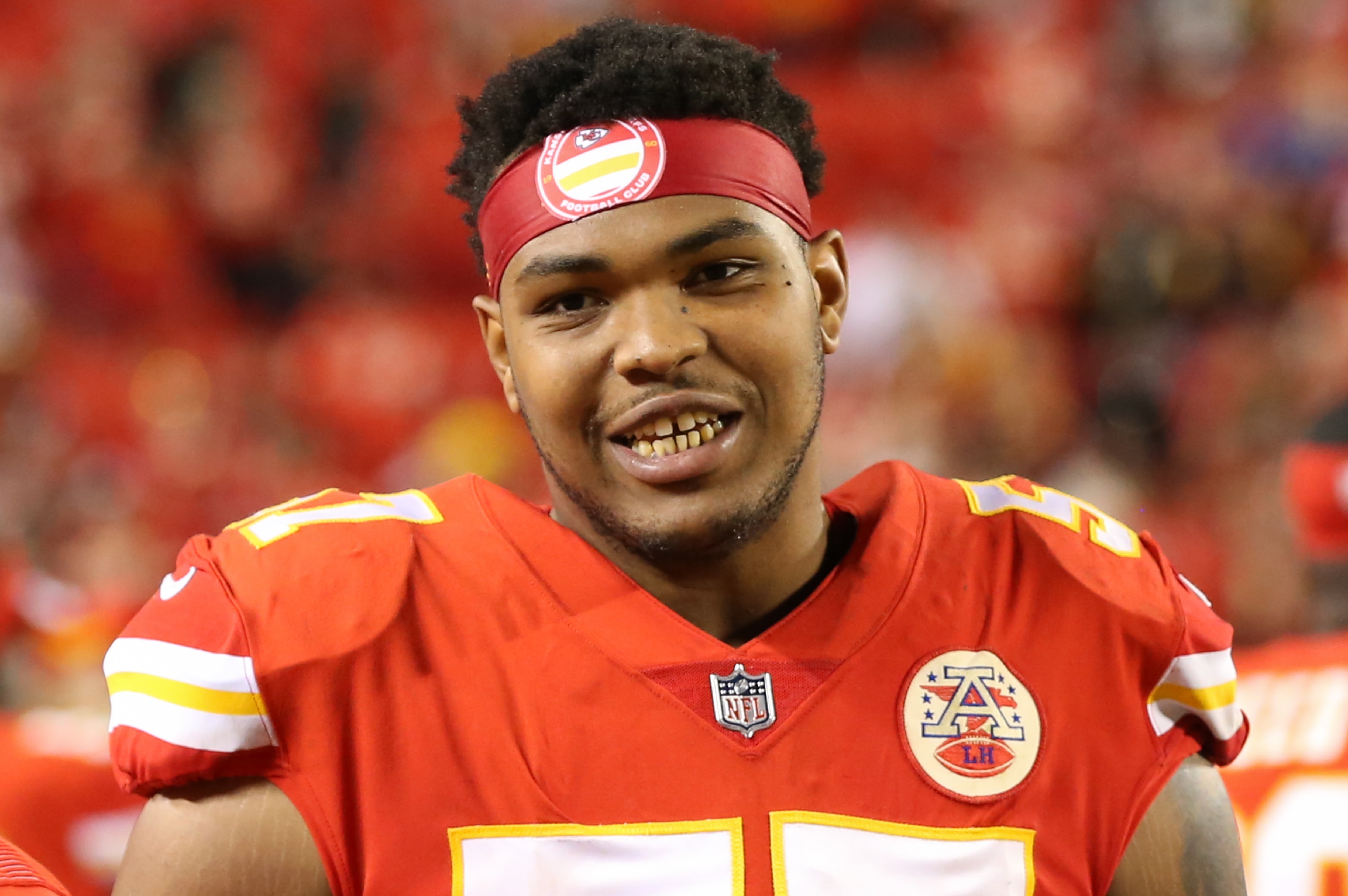 KANSAS CITY, MO - DECEMBER 26: Kansas City Chiefs offensive tackle Orlando Brown (57) smiles on the sidelines during an NFL game between the Pittsburgh Steelers and Kansas City Chiefs on Dec 26, 2021 at GEHA Field at Arrowhead Stadium in Kansas City, MO. (Photo by Scott Winters/Icon Sportswire via Getty Images)