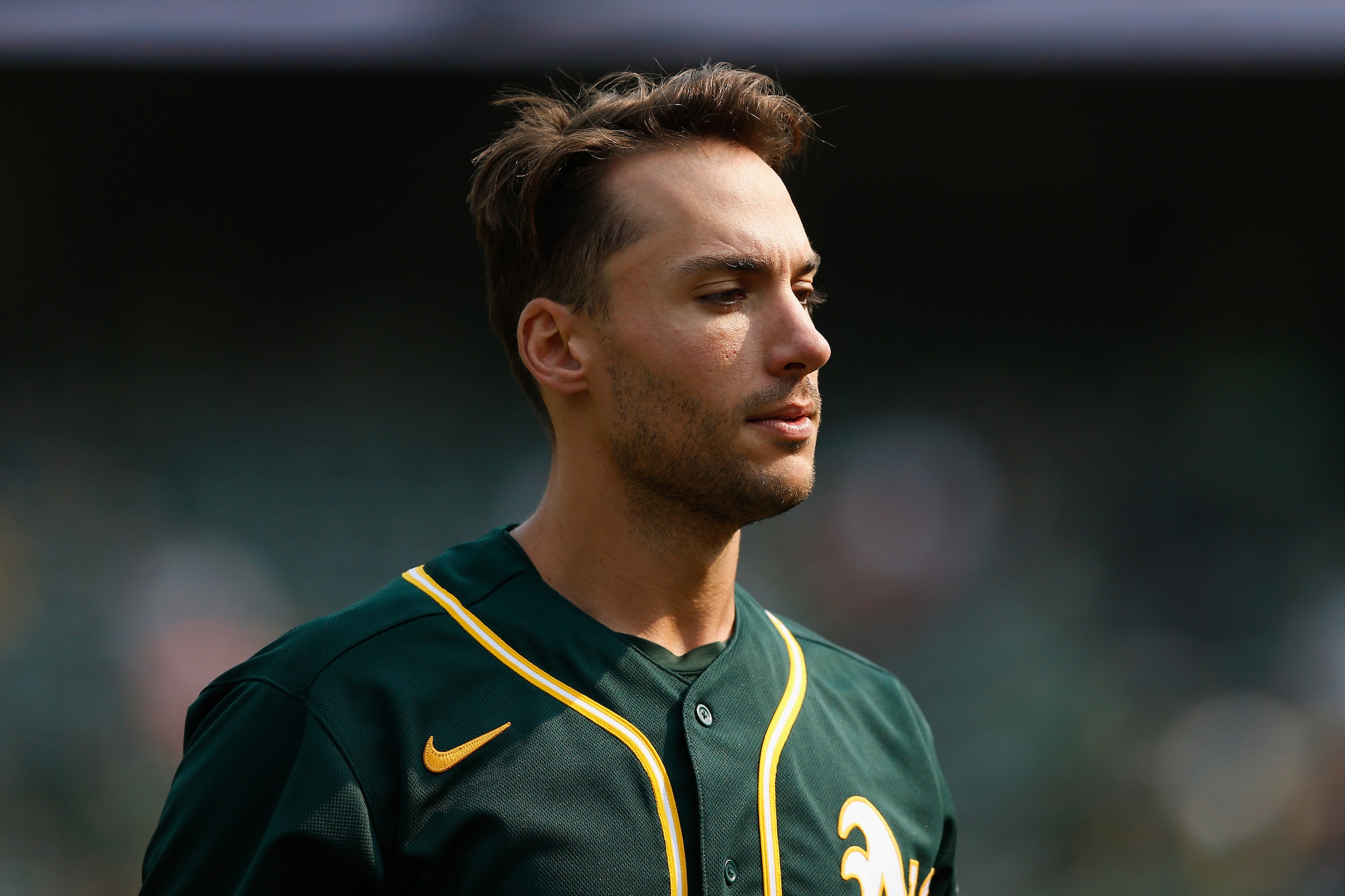 OAKLAND, CALIFORNIA - SEPTEMBER 25: Matt Olson #28 of the Oakland Athletics looks on between innings against the Houston Astros at RingCentral Coliseum on September 25, 2021 in Oakland, California. (Photo by Lachlan Cunningham/Getty Images)