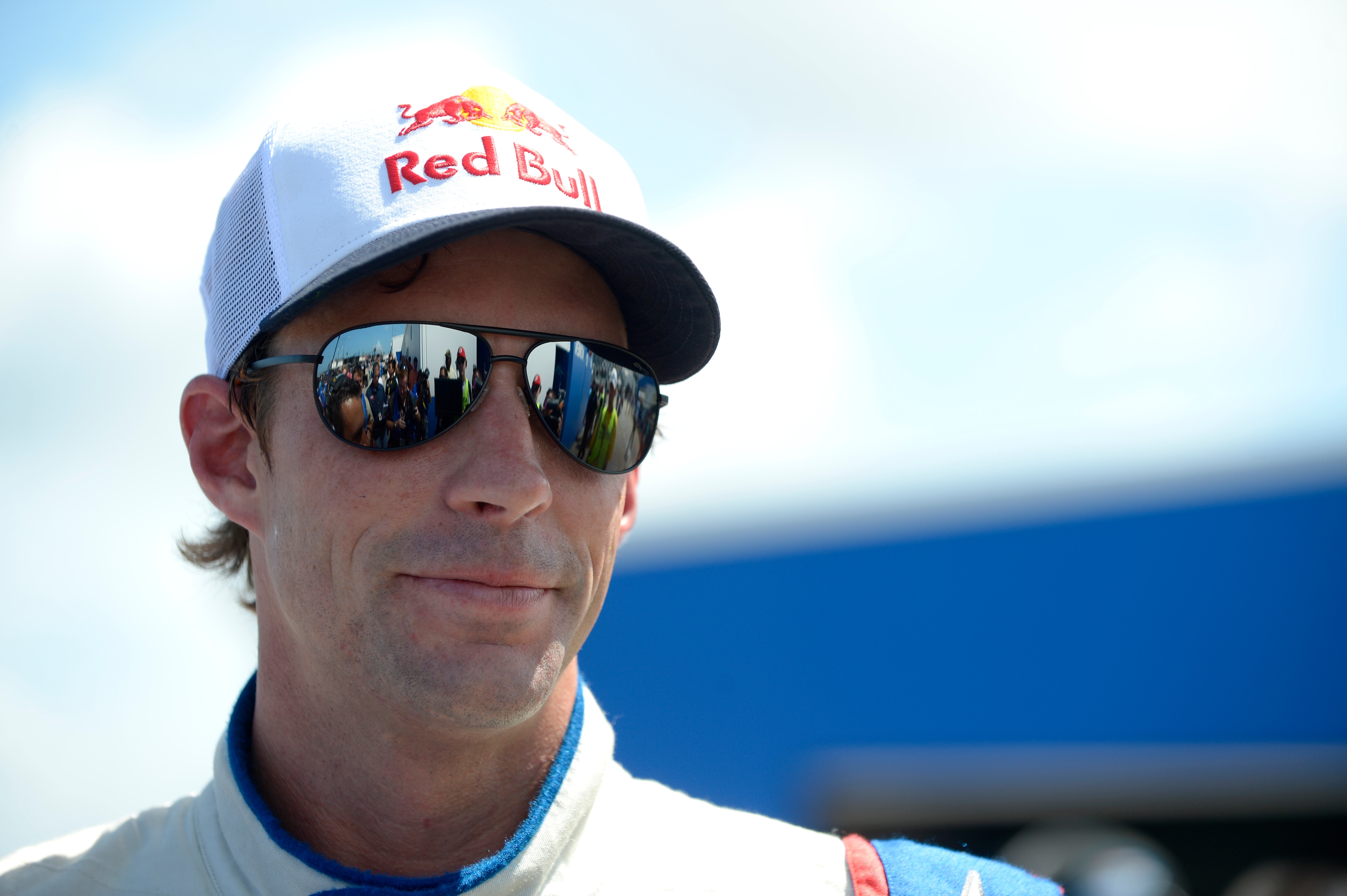 Travis Pastrana stands in the garage area after completing his laps during qualifying for the NASCAR Nationwide auto race at Daytona International Speedway in Daytona Beach, Fla., Friday, July 5, 2013.(AP Photo/Phelan M. Ebenhack)