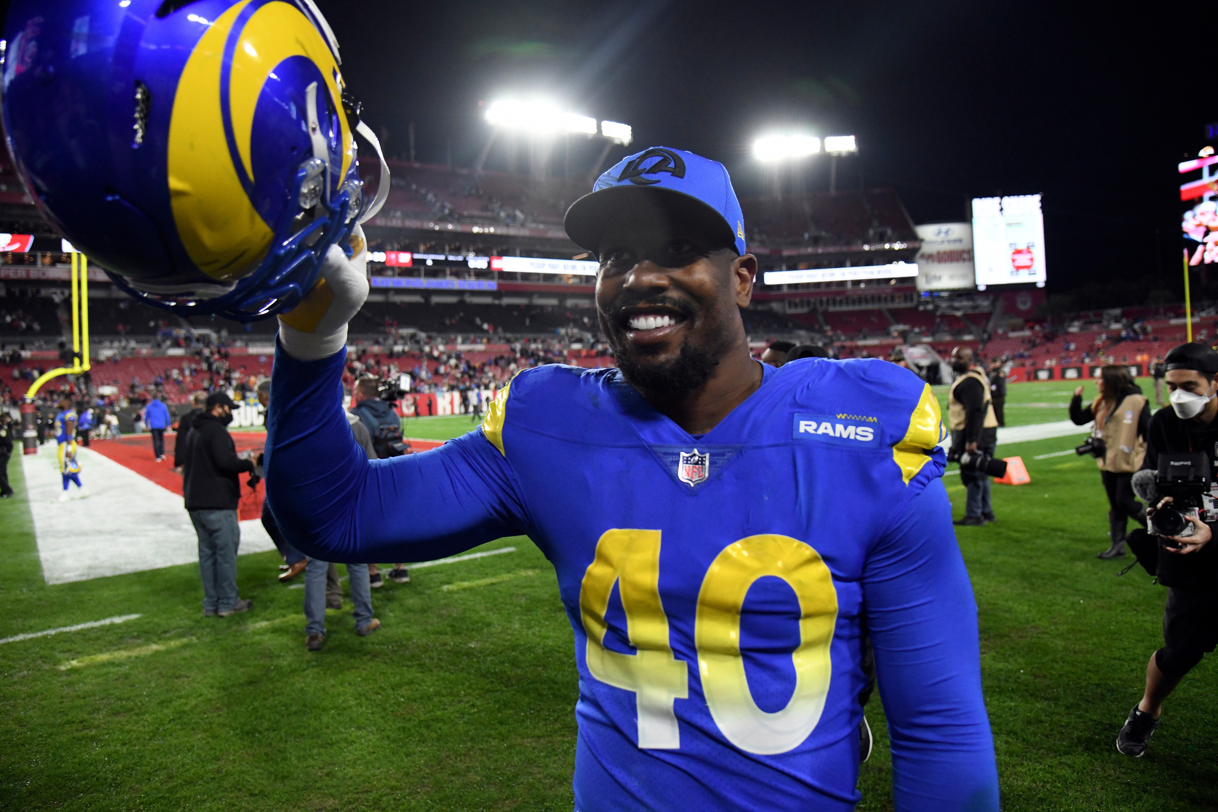 Los Angeles Rams outside linebacker Von Miller (40) celebrates after the team defeatdd the Tampa Bay Buccaneers during an NFL divisional round playoff football game Sunday, Jan. 23, 2022, in Tampa, Fla. (AP Photo/Jason Behnken) Los Angeles Rams outside linebacker Von Miller (40) celebrates after the team defeatdd the Tampa Bay Buccaneers during an NFL divisional round playoff football game Sunday, Jan. 23, 2022, in Tampa, Fla. (AP Photo/Jason Behnken)