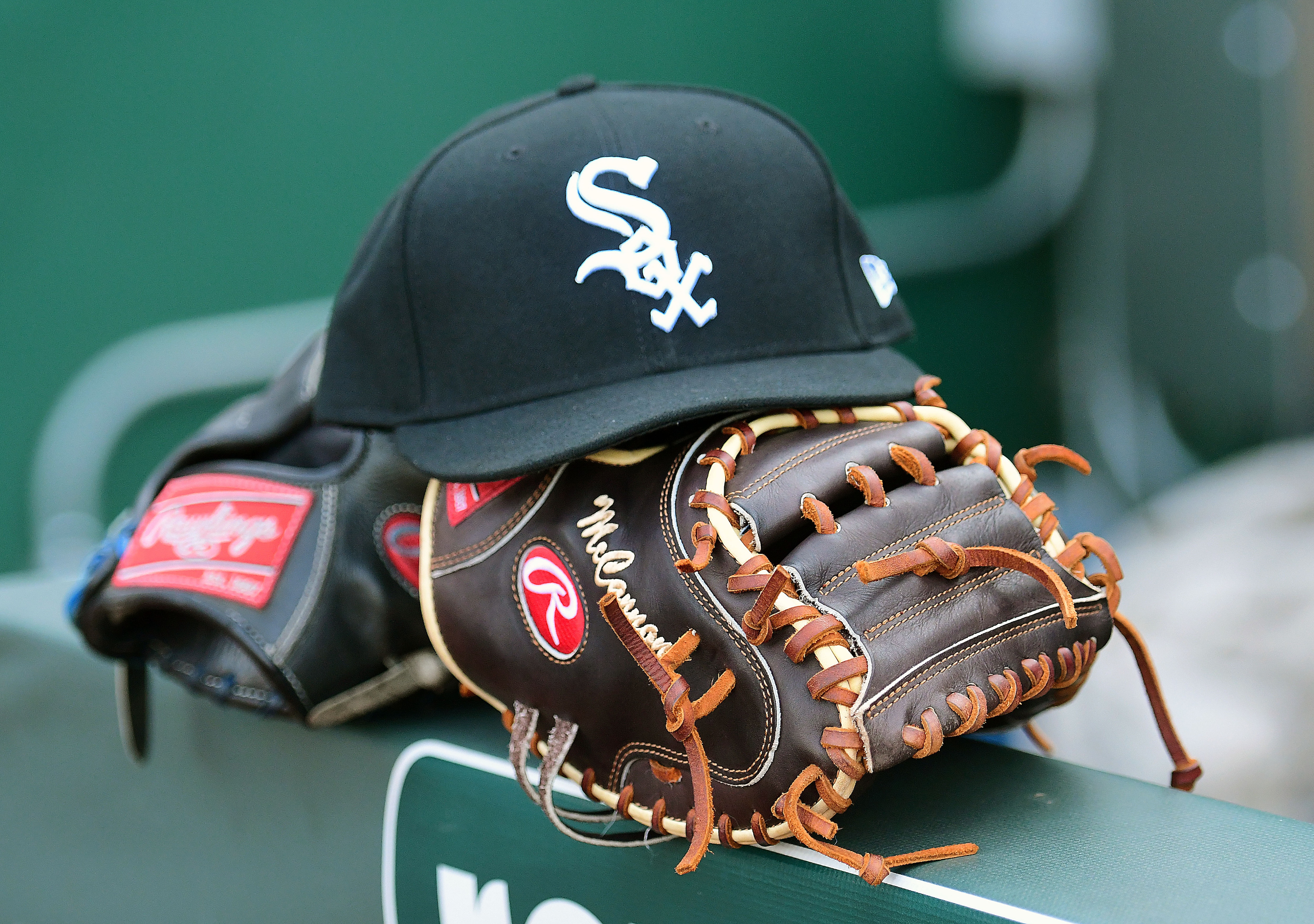 KANSAS CITY, MO. - JULY 17: A White Sox hat and gloves sit ready to be used before a Major League Baseball game between the Chicago White Sox and the Kansas City Royals on July 17, 2019, at  Kauffman Stadium, Kansas City, MO. (Photo by Keith Gillett/Icon Sportswire via Getty Images)