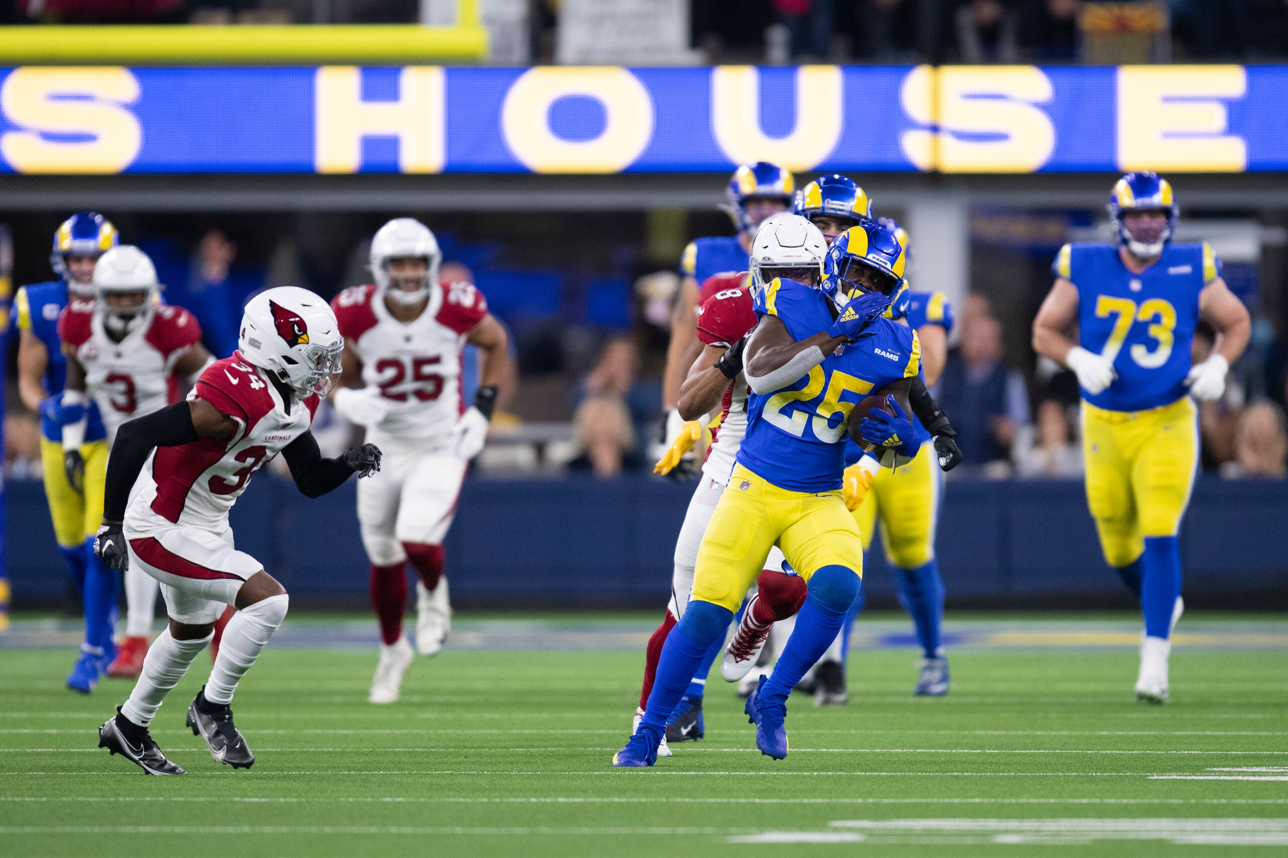 Los Angeles Rams running back Sony Michel (25) runs with the ball during an NFL wild-card playoff football game against the Arizona Cardinals Monday, Jan. 17, 2022, in Inglewood, Calif. (AP Photo/Kyusung Gong)