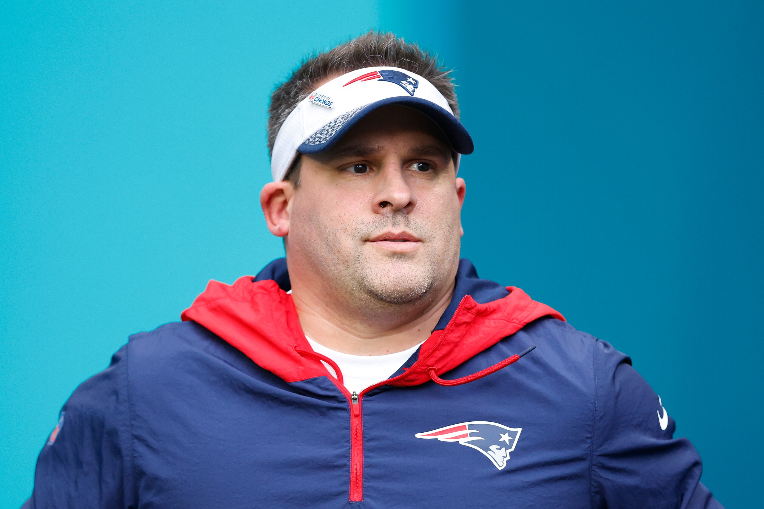MIAMI GARDENS, FLORIDA - JANUARY 09: Offensive coordinator Josh McDaniels of the New England Patriots takes the field prior to the game against the Miami Dolphins at Hard Rock Stadium on January 09, 2022 in Miami Gardens, Florida. (Photo by Michael Reaves/Getty Images)