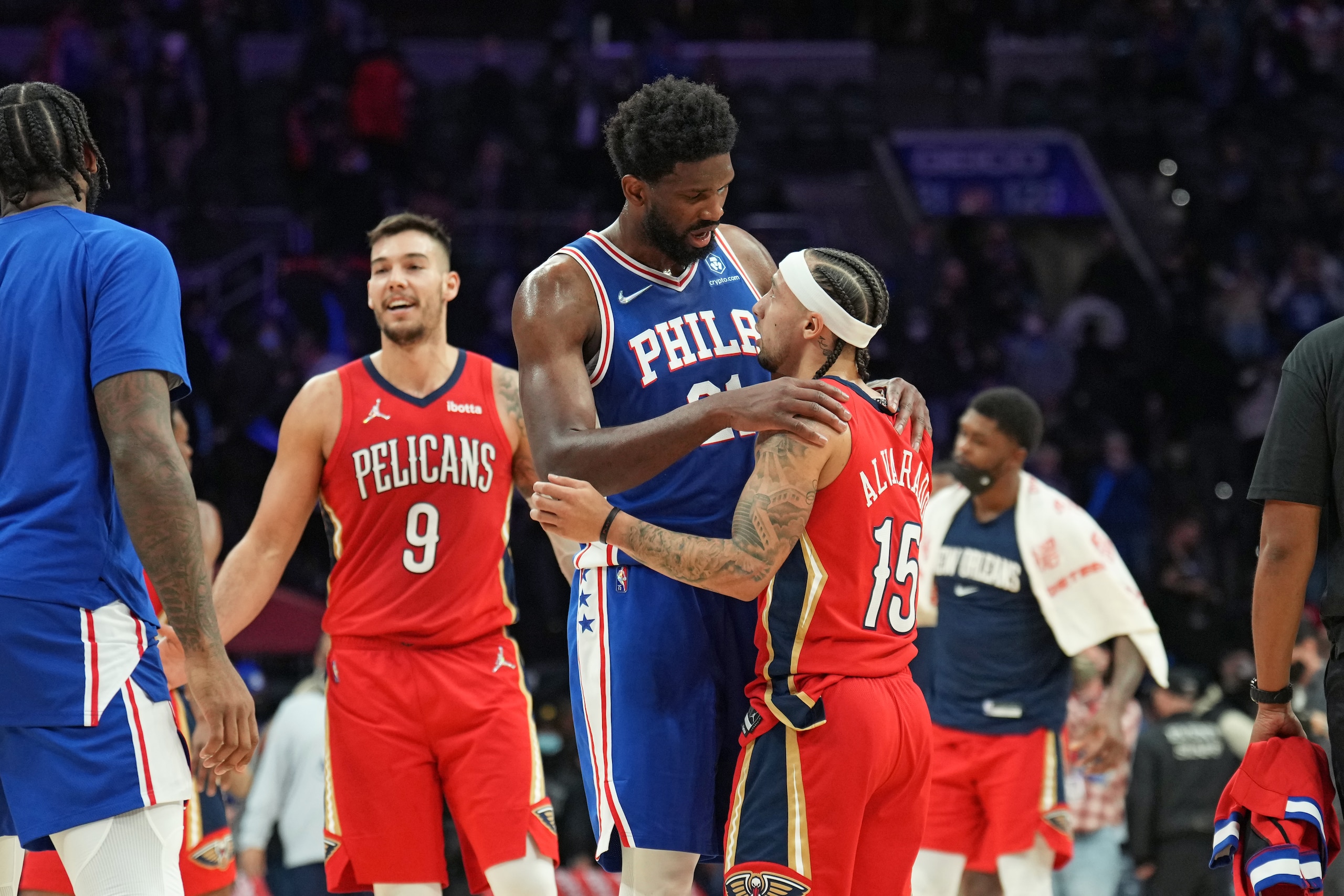 PHILADELPHIA, PA - JANUARY 25: Joel Embiid #21 of the Philadelphia 76ers and Jose Alvarado #15 of the New Orleans Pelicans talk after a game on January 25, 2022 at Wells Fargo Center in Philadelphia, Pennsylvania. NOTE TO USER: User expressly acknowledges and agrees that, by downloading and/or using this Photograph, user is consenting to the terms and conditions of the Getty Images License Agreement. Mandatory Copyright Notice: Copyright 2022 NBAE (Photo by Jesse D. Garrabrant/NBAE via Getty Images)