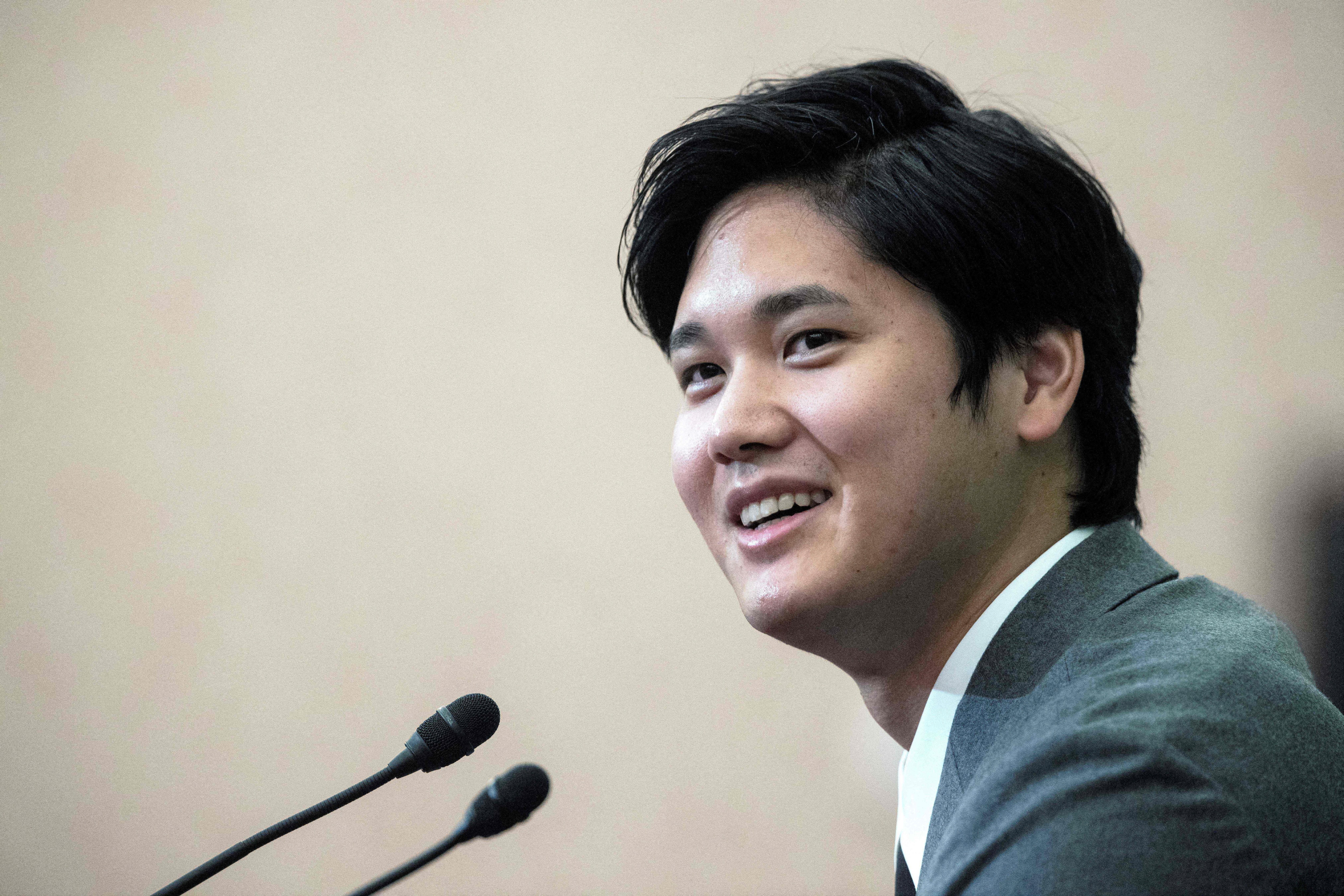 Major League Baseball (MLB) All-Star player Shohei Ohtani of Japan, who plays for the Los Angeles Angels, attends a press conference in Tokyo on November 15, 2021. (Photo by Behrouz MEHRI / AFP) (Photo by BEHROUZ MEHRI/AFP via Getty Images)