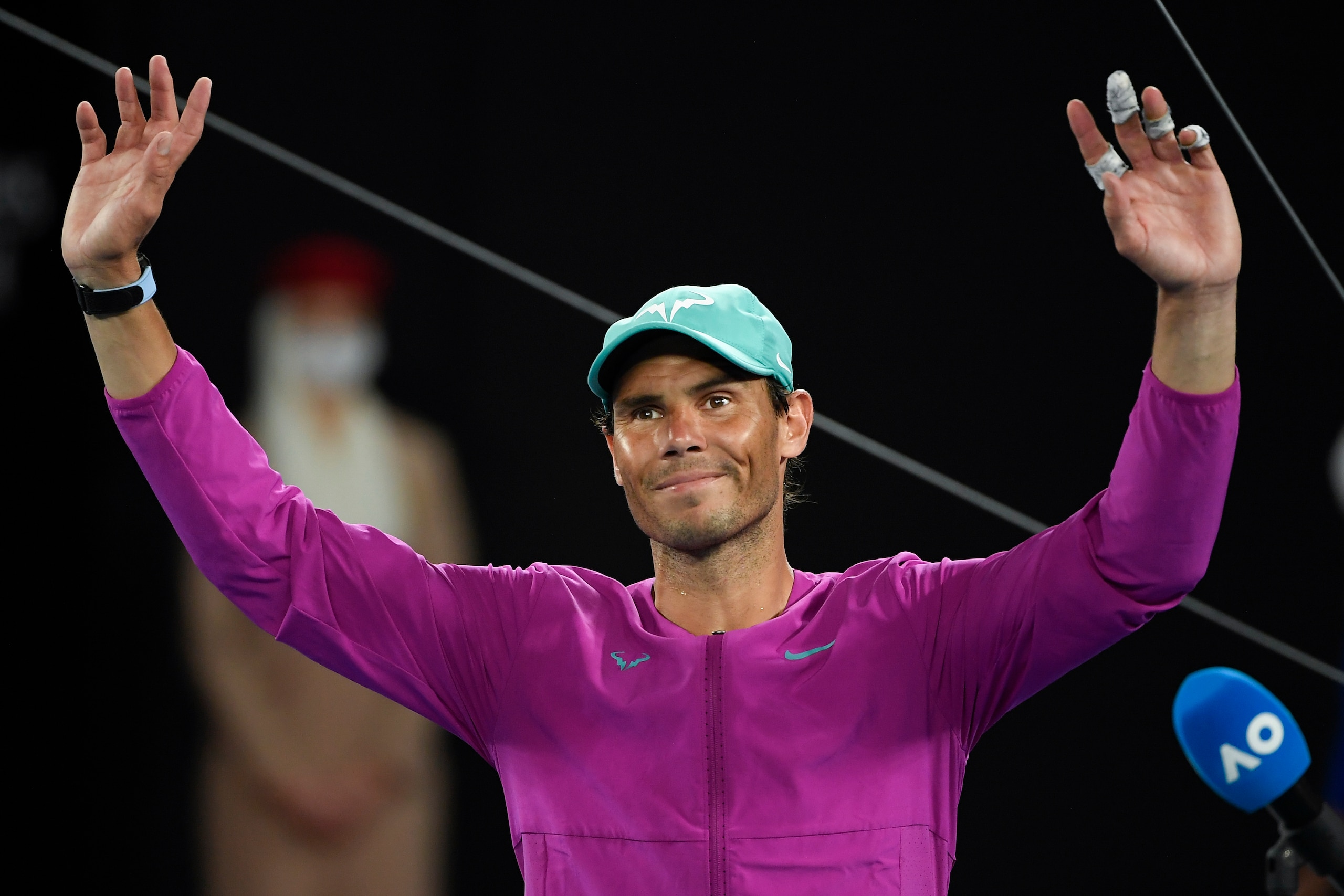 Rafael Nadal of Spain celebrates after defeating Matteo Berrettini of Italy in their semifinal match at the Australian Open tennis championships in Melbourne, Australia, Friday, Jan. 28, 2022. (AP Photo/Andy Brownbill)
