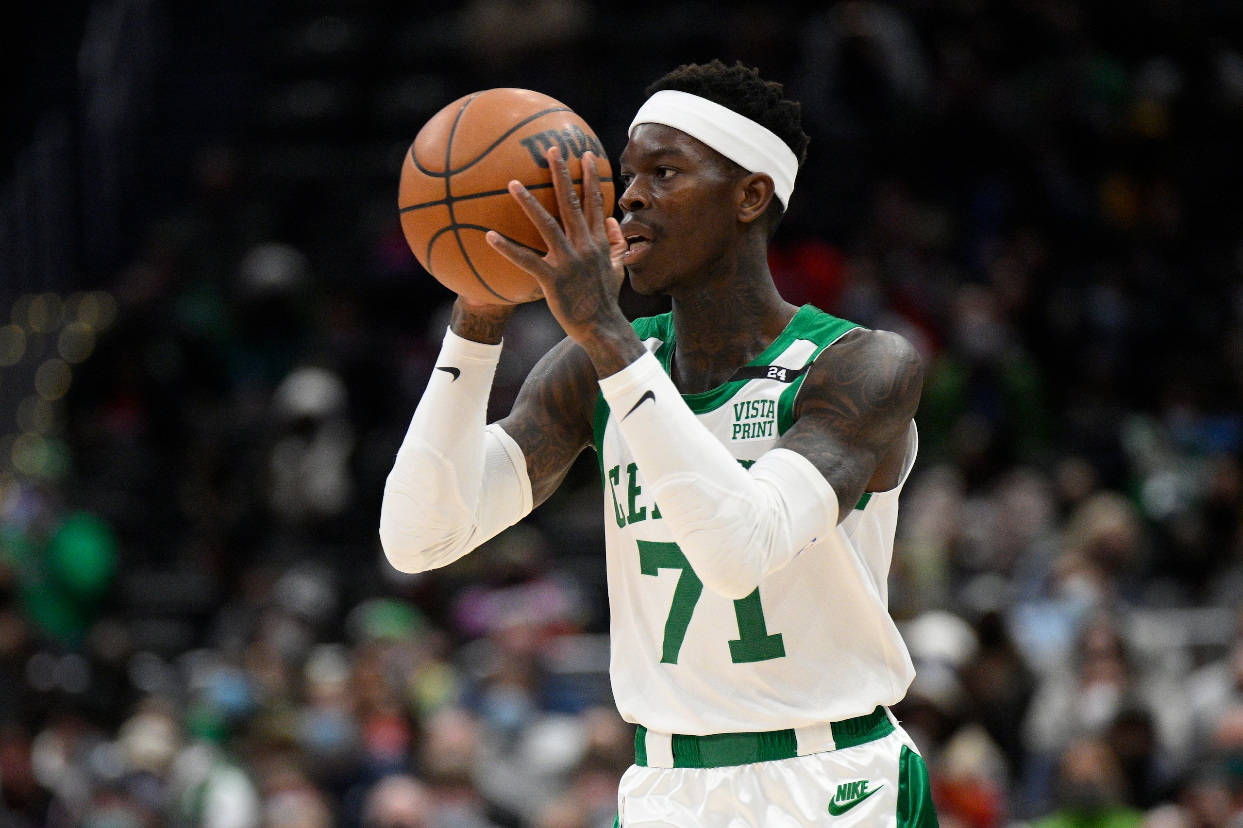 Boston Celtics guard Dennis Schroder (71) in action during the first half of an NBA basketball game against the Washington Wizards, Sunday, Jan. 23, 2022, in Washington. (AP Photo/Nick Wass)