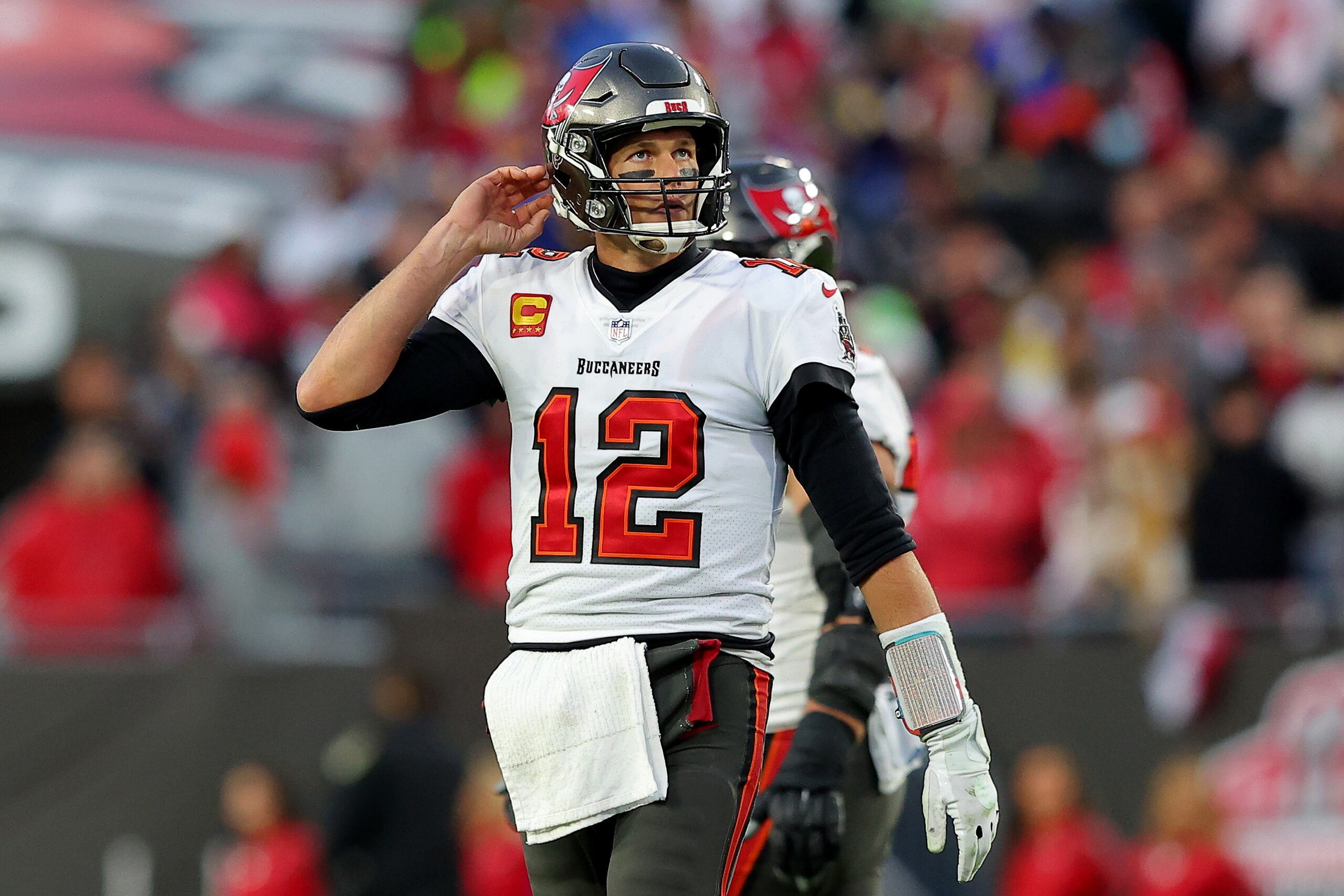 TAMPA, FLORIDA - JANUARY 23: Tom Brady #12 of the Tampa Bay Buccaneers reacts in the fourth quarter of the game against the Los Angeles Rams in the NFC Divisional Playoff game at Raymond James Stadium on January 23, 2022 in Tampa, Florida. (Photo by Kevin C. Cox/Getty Images) TAMPA, FLORIDA - JANUARY 23: Tom Brady #12 of the Tampa Bay Buccaneers reacts in the fourth quarter of the game against the Los Angeles Rams in the NFC Divisional Playoff game at Raymond James Stadium on January 23, 2022 in Tampa, Florida. (Photo by Kevin C. Cox/Getty Images)