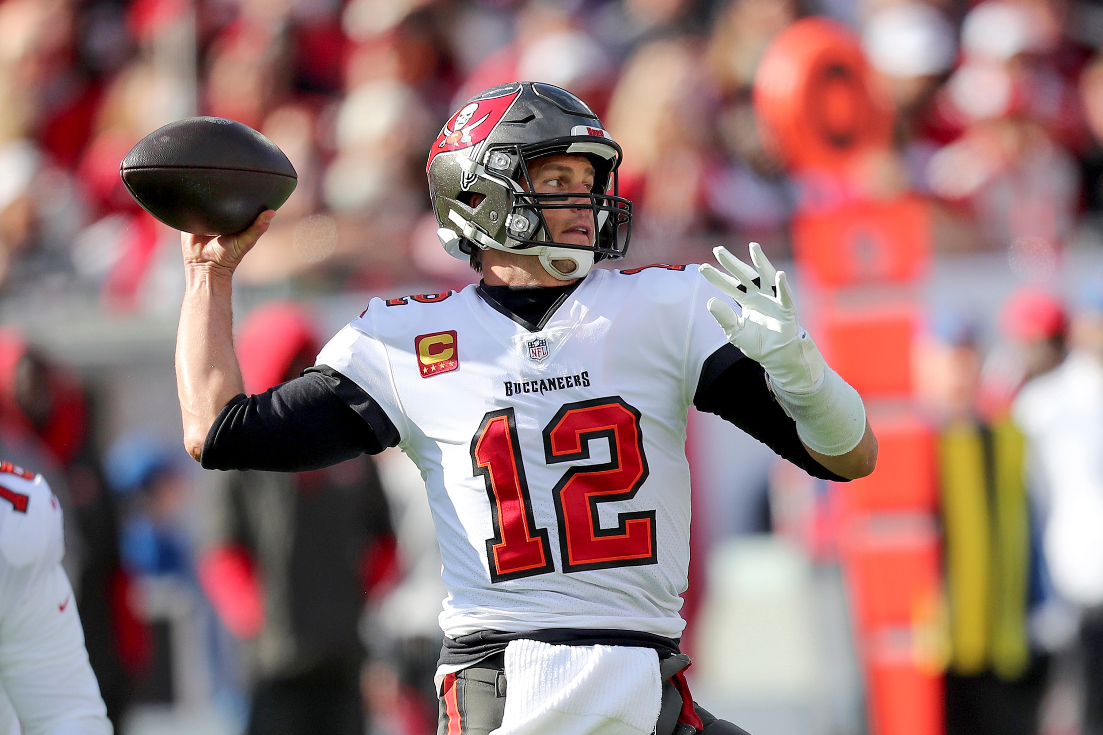 Tampa Bay Buccaneers quarterback Tom Brady (12) attempts a pass during a NFL divisional playoff football game between the Los Angeles Rams and Tampa Bay Buccaneers, Sunday, January 23, 2022 in Tampa, Fla. (AP Photo/Alex Menendez)