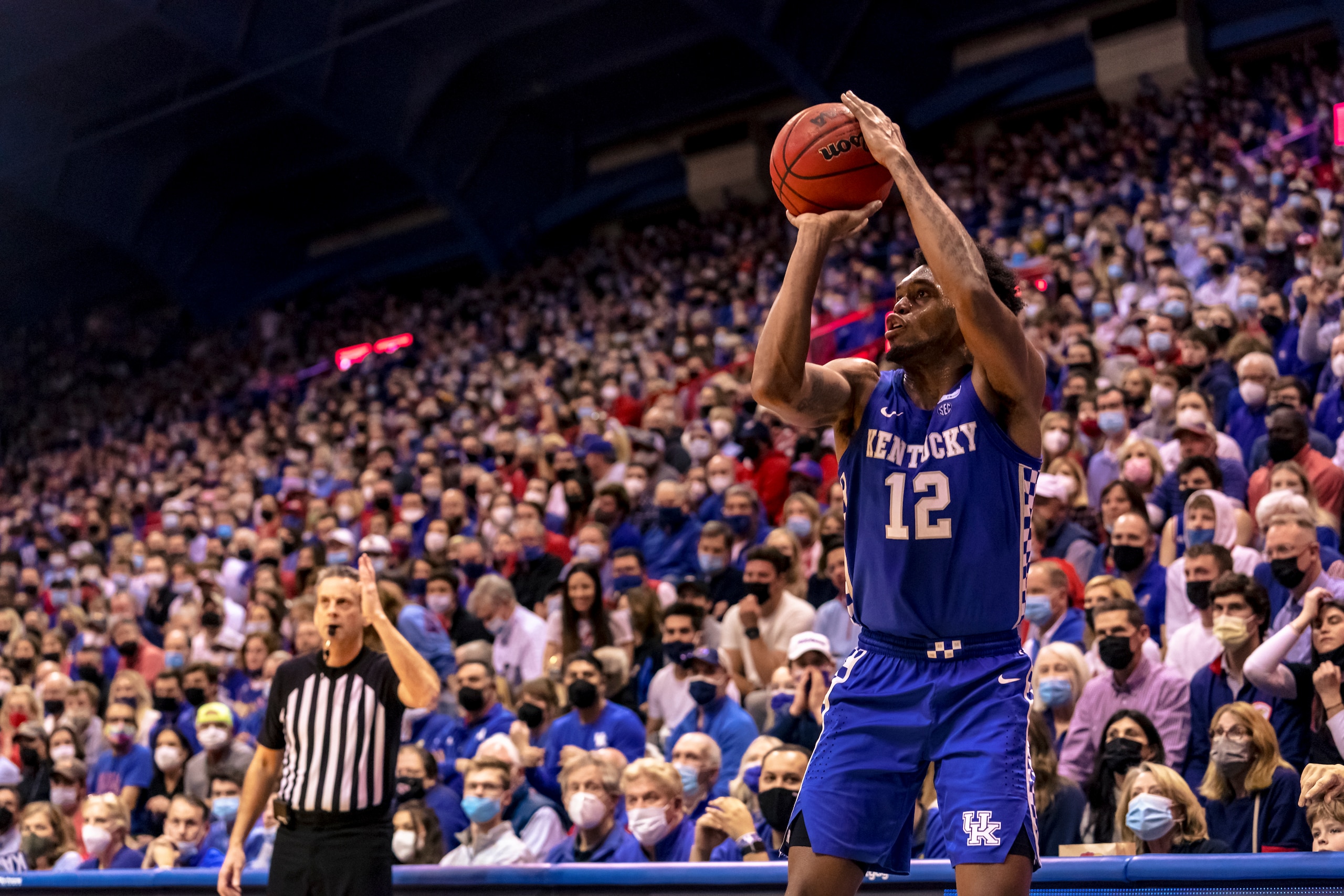 LAWRENCE, KS - JANUARY 29: Keion Brooks Jr. #12 of the Kentucky Wildcats lines up a shot against the Kansas Jayhawks in the second half at Allen Fieldhouse on January 29, 2022 in Lawrence, Kansas. (Photo by Kyle Rivas/Getty Images)