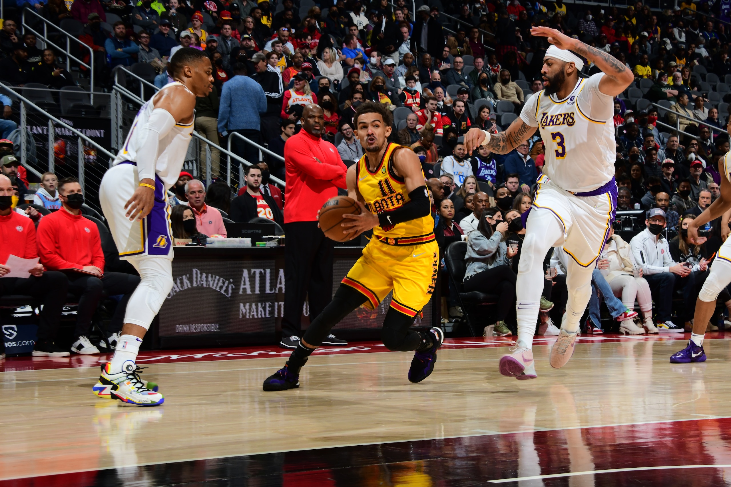 ATLANTA, GA - JANUARY 30: Trae Young #11 of the Atlanta Hawks drives to the basket during the game against the Los Angeles Lakers on January 30, 2022 at State Farm Arena in Atlanta, Georgia.  NOTE TO USER: User expressly acknowledges and agrees that, by downloading and/or using this Photograph, user is consenting to the terms and conditions of the Getty Images License Agreement. Mandatory Copyright Notice: Copyright 2022 NBAE (Photo by Scott Cunningham/NBAE via Getty Images)