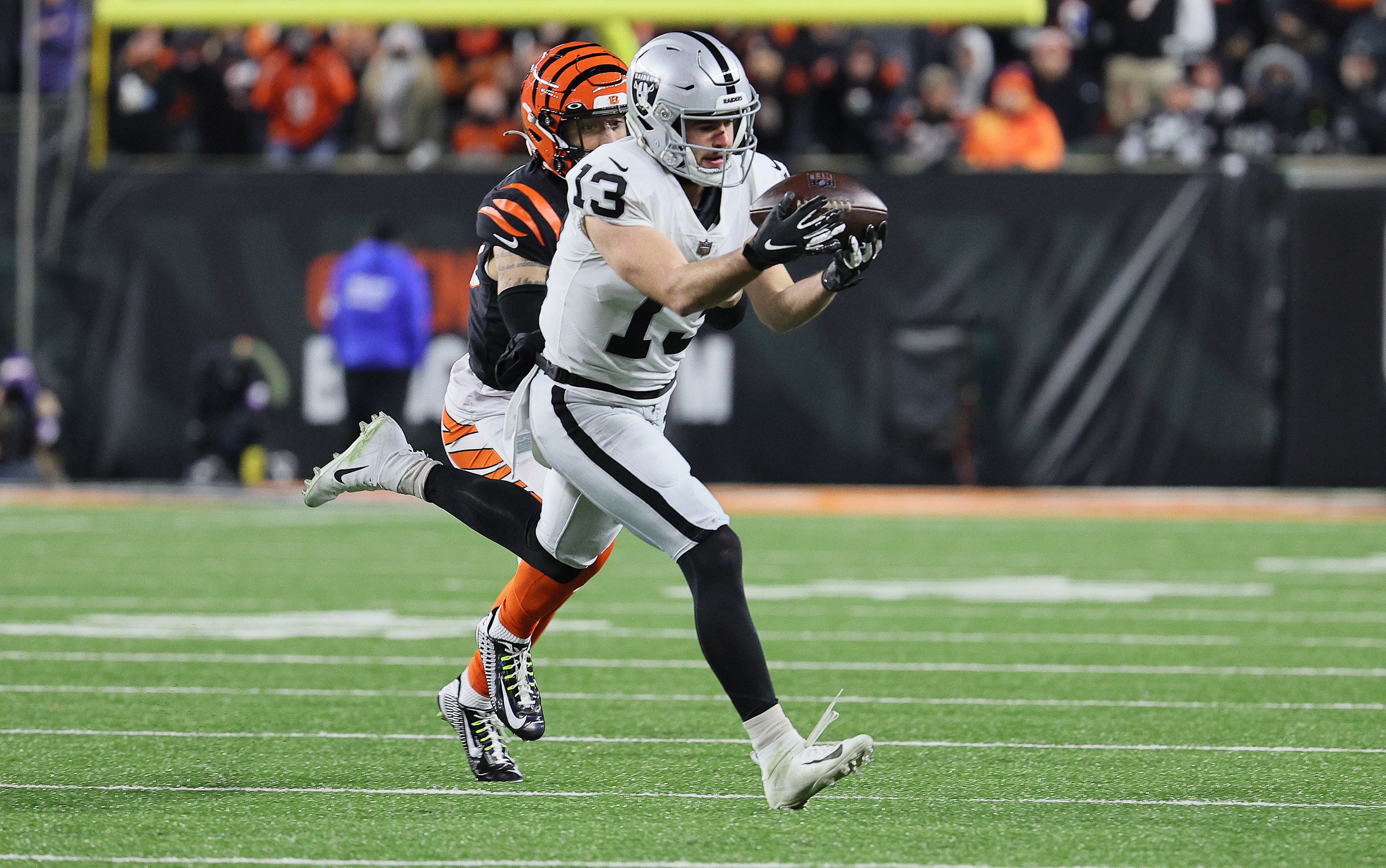 CINCINNATI, OHIO - JANUARY 15: Hunter Renfrow #13 of the Las Vegas Raiders against the Cincinnati Bengals during the AFC Wild Card Playoff game at Paul Brown Stadium on January 15, 2022 in Cincinnati, Ohio. (Photo by Andy Lyons/Getty Images)