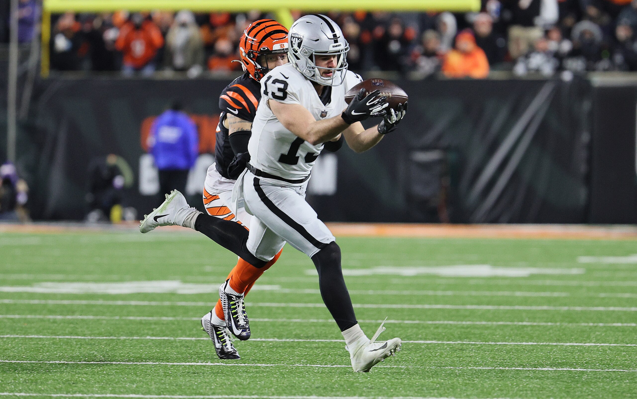CINCINNATI, OHIO - JANUARY 15: Hunter Renfrow #13 of the Las Vegas Raiders against the Cincinnati Bengals during the AFC Wild Card Playoff game at Paul Brown Stadium on January 15, 2022 in Cincinnati, Ohio. (Photo by Andy Lyons/Getty Images)
