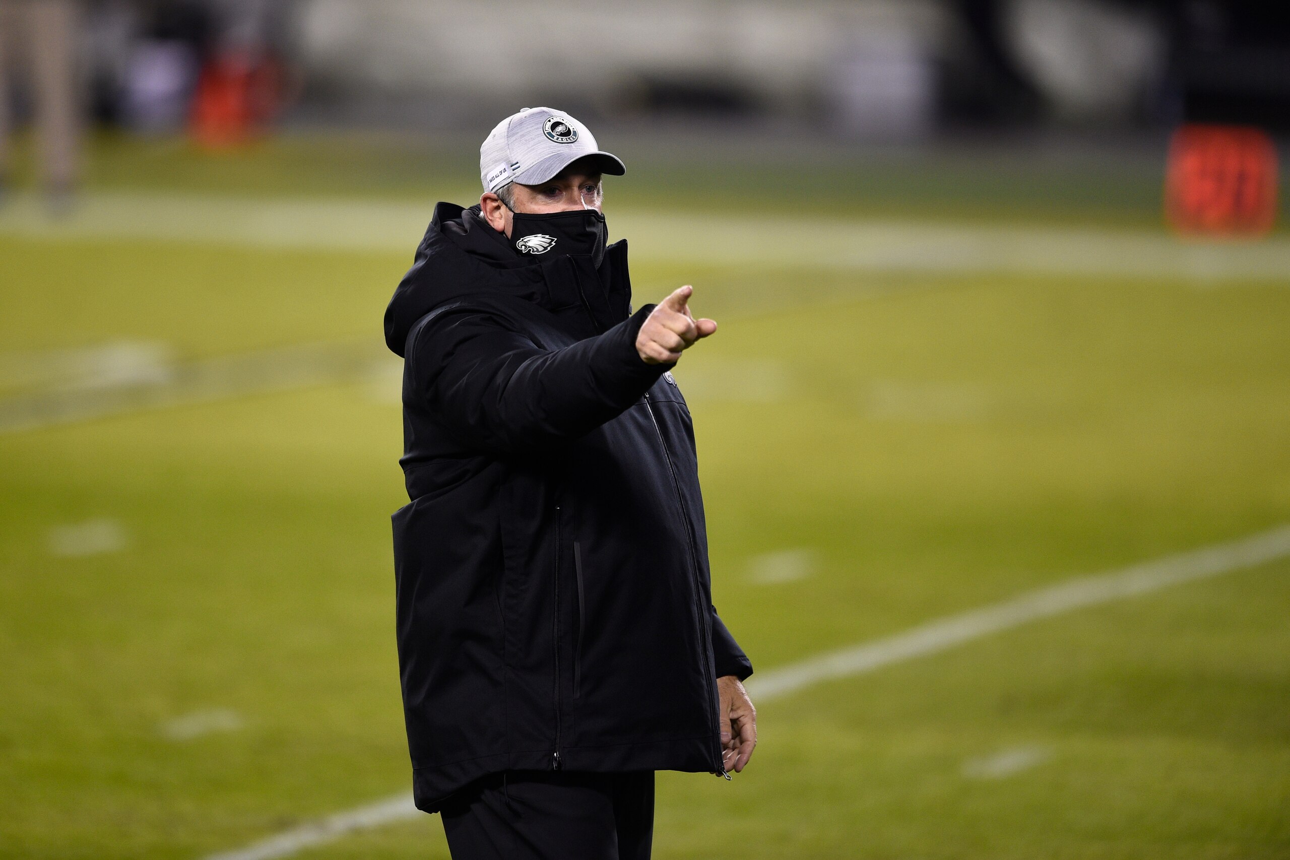 Philadelphia Eagles' Doug Pederson walks the field before an NFL football game against the Washington Football Team, Sunday, Jan. 3, 2021, in Philadelphia. (AP Photo/Derik Hamilton)