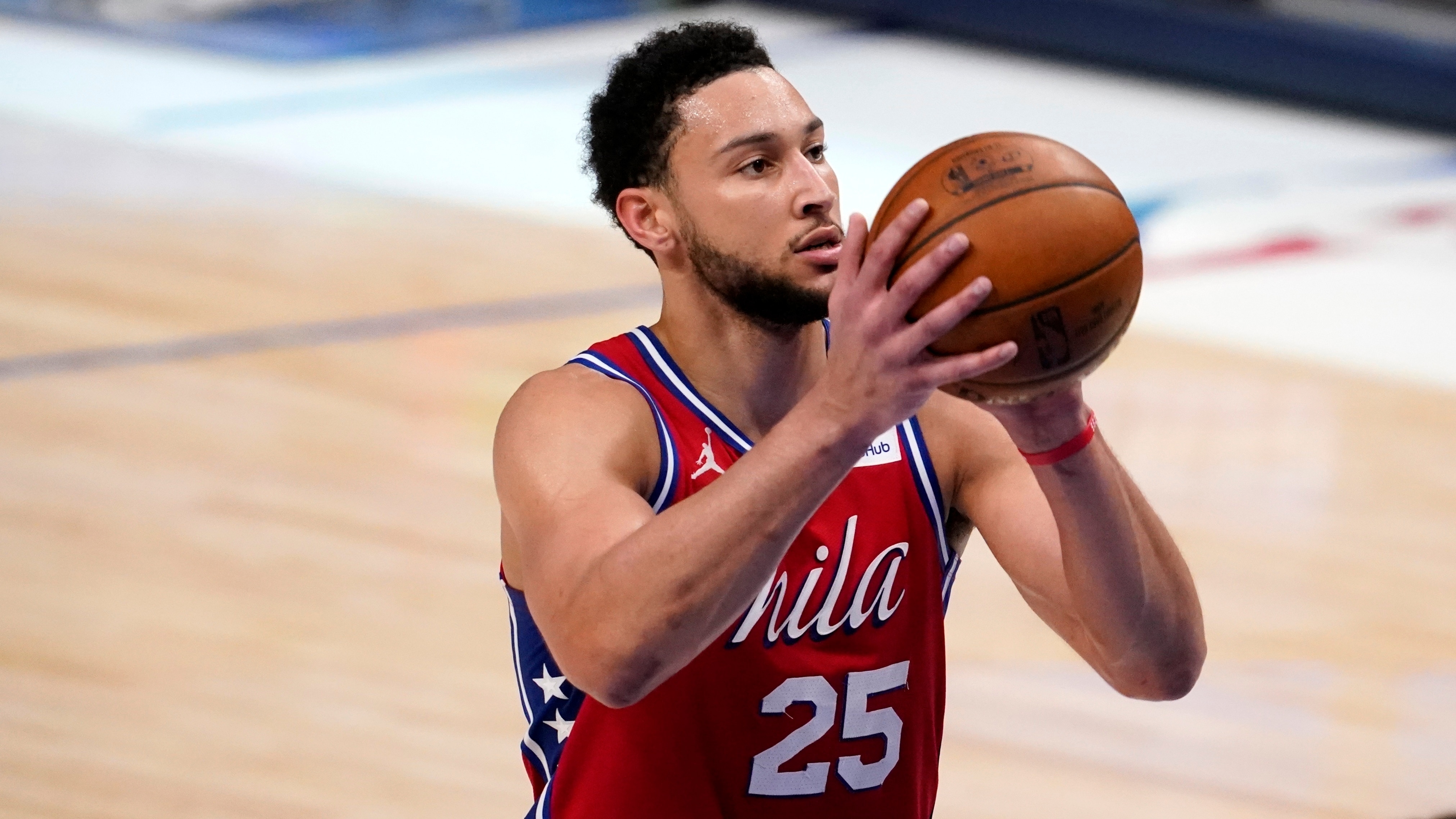 FILE - Philadelphia 76ers' Ben Simmons shoots free throws during an NBA basketball game against the Dallas Mavericks in Dallas, in this Monday, April 12, 2021, file photo. Ben Simmons can't shoot and lost his confidence. He blamed a mental block on the worst free-throw shooting percentage in NBA playoff history. The 76ers head into the offseason faced with a big question - do they try and salvage Simmons or deal the former No. 1 pick. . (AP Photo/Tony Gutierrez)