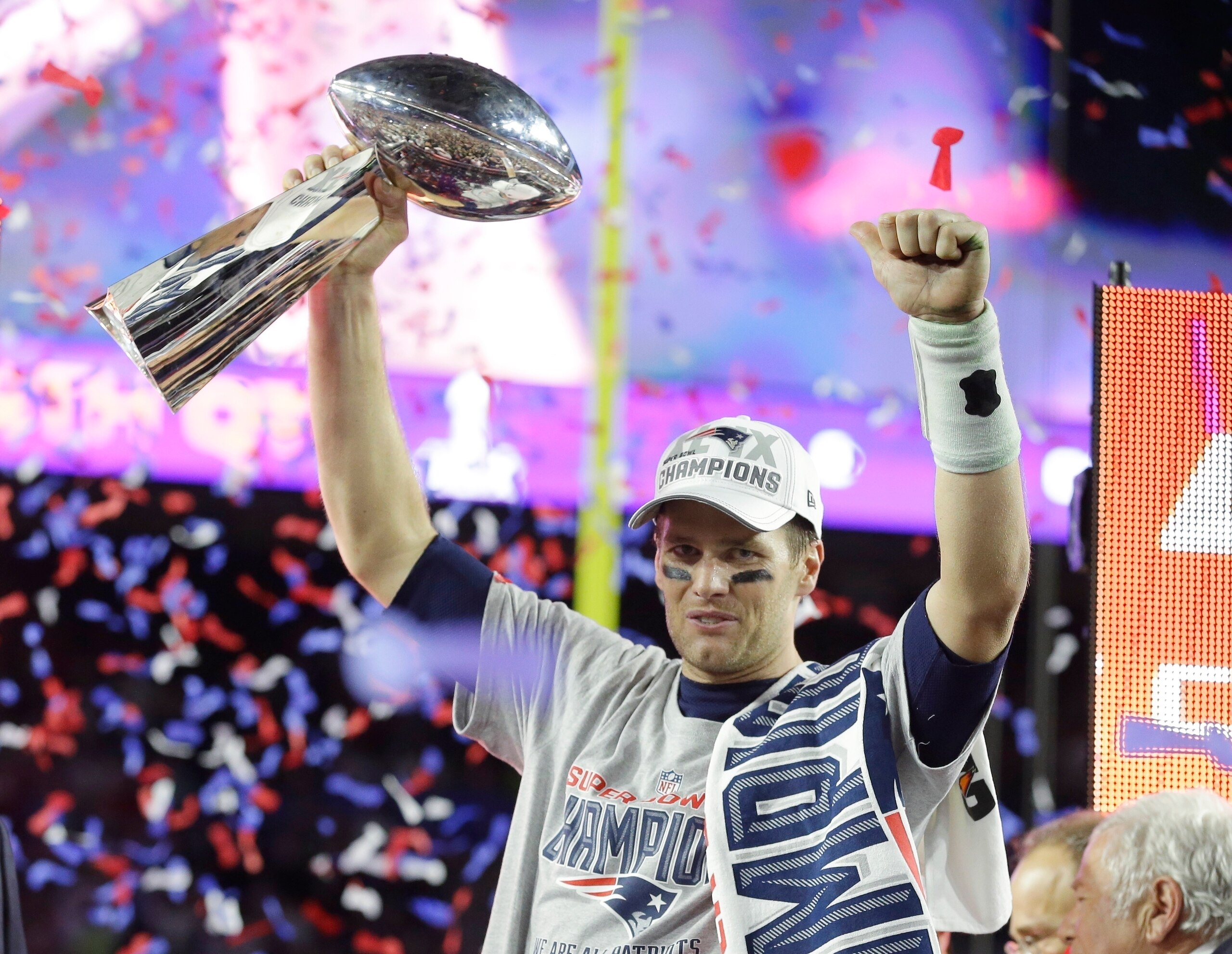FILE - New England Patriots quarterback Tom Brady celebrates with the Vince Lombardi Trophy after the NFL Super Bowl XLIX football game against the Seattle Seahawks Sunday, Feb. 1, 2015, in Glendale, Ariz. The Patriots won 28-24. Tom Brady has retired after winning seven Super Bowls and setting numerous passing records in an unprecedented 22-year-career. He made the announcement, Tuesday, Feb. 1, 2022, in a long post on Instagram. (AP Photo/Michael Conroy, File)