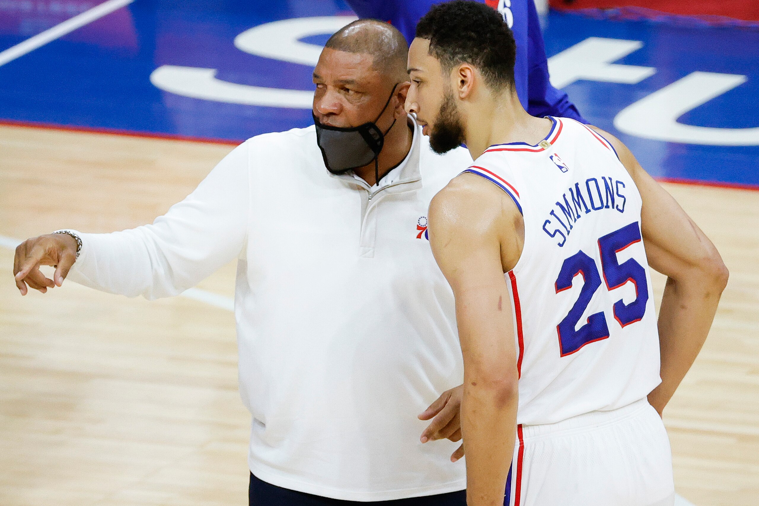 PHILADELPHIA, PENNSYLVANIA - APRIL 28: Head coach Doc Rivers of the Philadelphia 76ers speaks with Ben Simmons #25 during the first quarter against the Atlanta Hawks at Wells Fargo Center on April 28, 2021 in Philadelphia, Pennsylvania. NOTE TO USER: User expressly acknowledges and agrees that, by downloading and or using this photograph, User is consenting to the terms and conditions of the Getty Images License Agreement. (Photo by Tim Nwachukwu/Getty Images) PHILADELPHIA, PENNSYLVANIA - APRIL 28: Head coach Doc Rivers of the Philadelphia 76ers speaks with Ben Simmons #25 during the first quarter against the Atlanta Hawks at Wells Fargo Center on April 28, 2021 in Philadelphia, Pennsylvania. NOTE TO USER: User expressly acknowledges and agrees that, by downloading and or using this photograph, User is consenting to the terms and conditions of the Getty Images License Agreement. (Photo by Tim Nwachukwu/Getty Images)