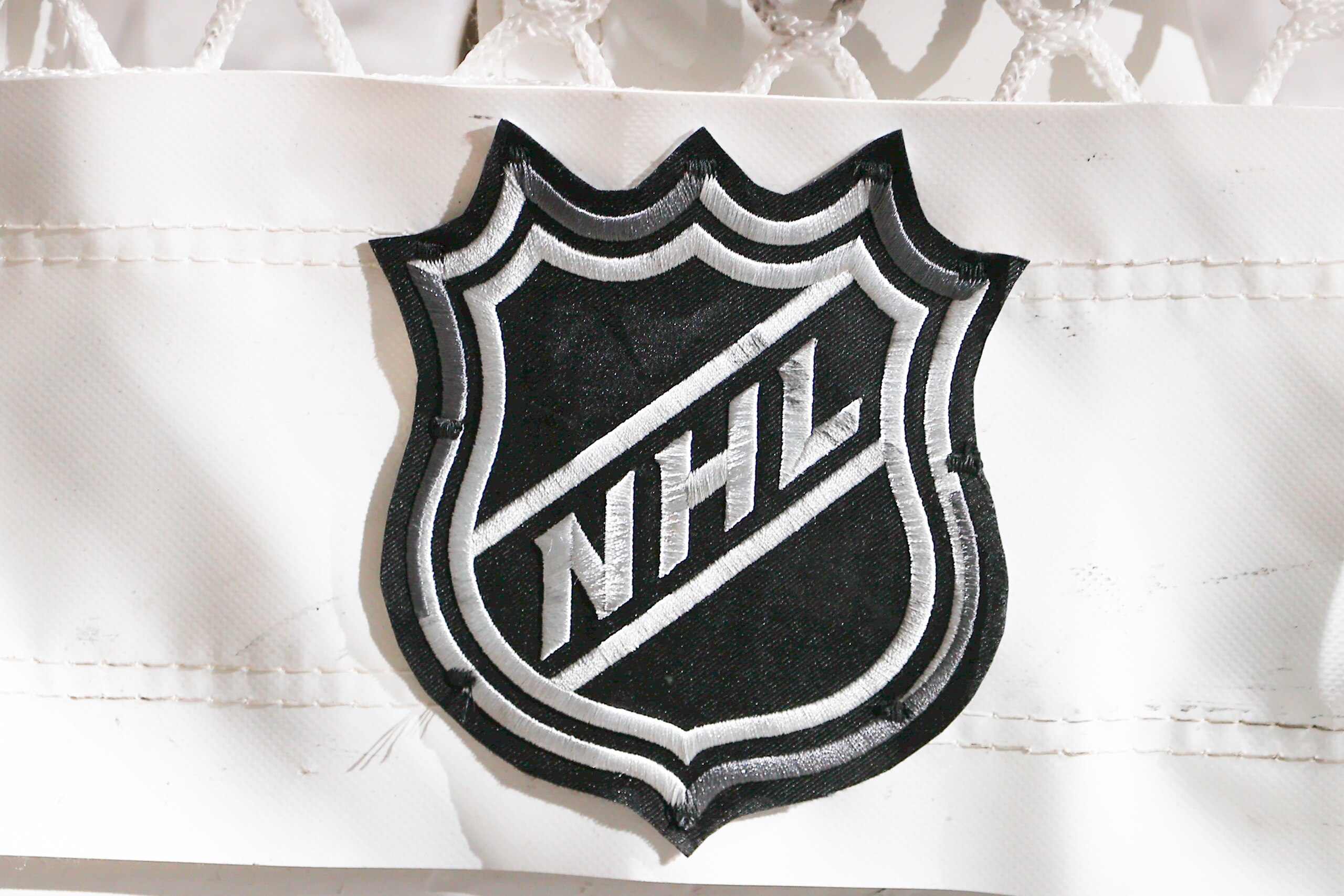 NEWARK, NJ - JANUARY 22:  A general view of the NHL Logo on the back of the goal prior to the National Hockey League game between the New Jersey Devils and the Carolina Hurricanes on January 22, 2022 at the Prudential Center in Newark, New Jersey.  (Photo by Rich Graessle/Getty Images)