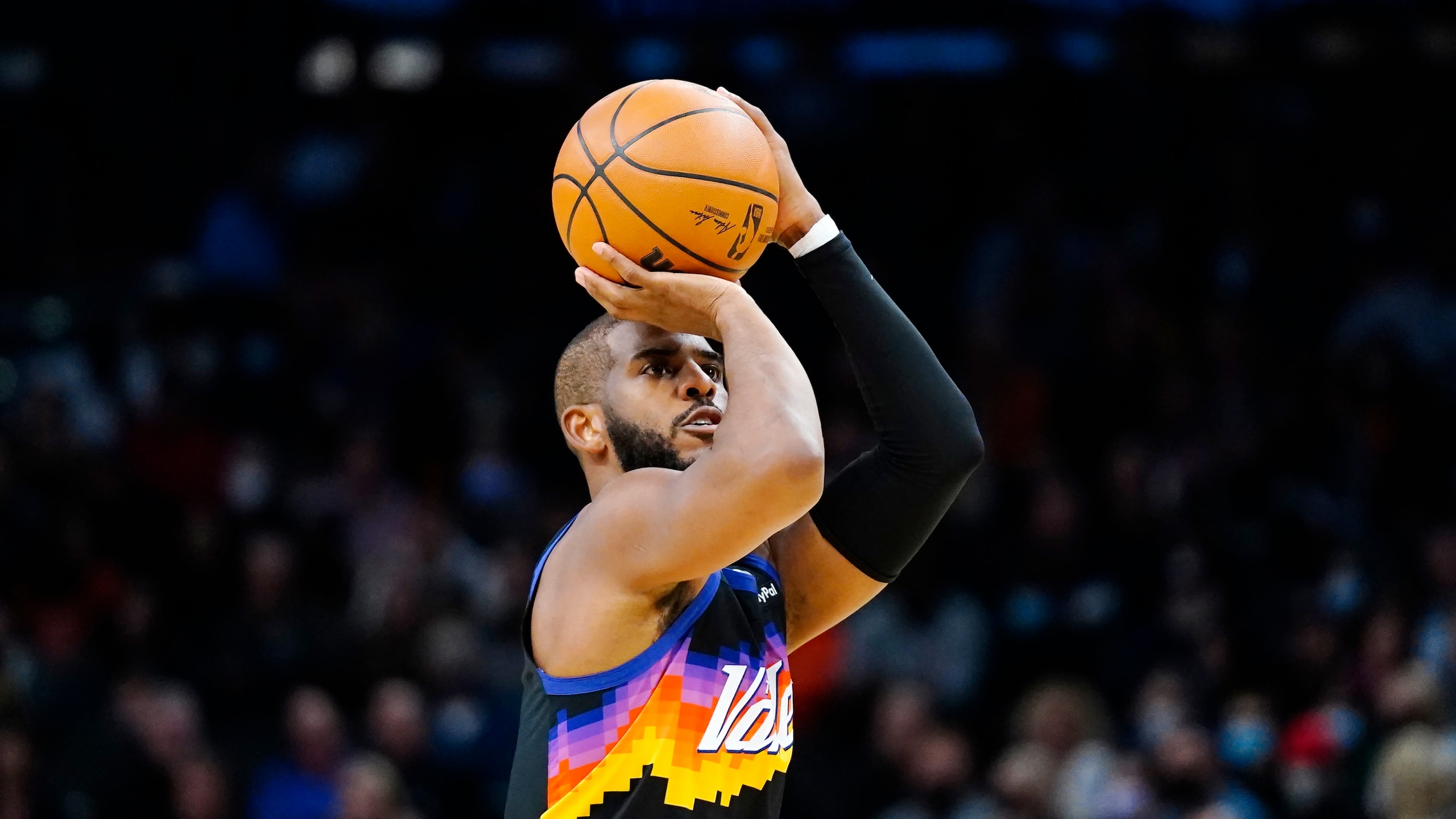 Phoenix Suns guard Chris Paul shoots a jumper against the Indiana Pacers during the second half of an NBA basketball game Saturday, Jan. 22, 2022, in Phoenix. The Suns won 113-103. (AP Photo/Ross D. Franklin)