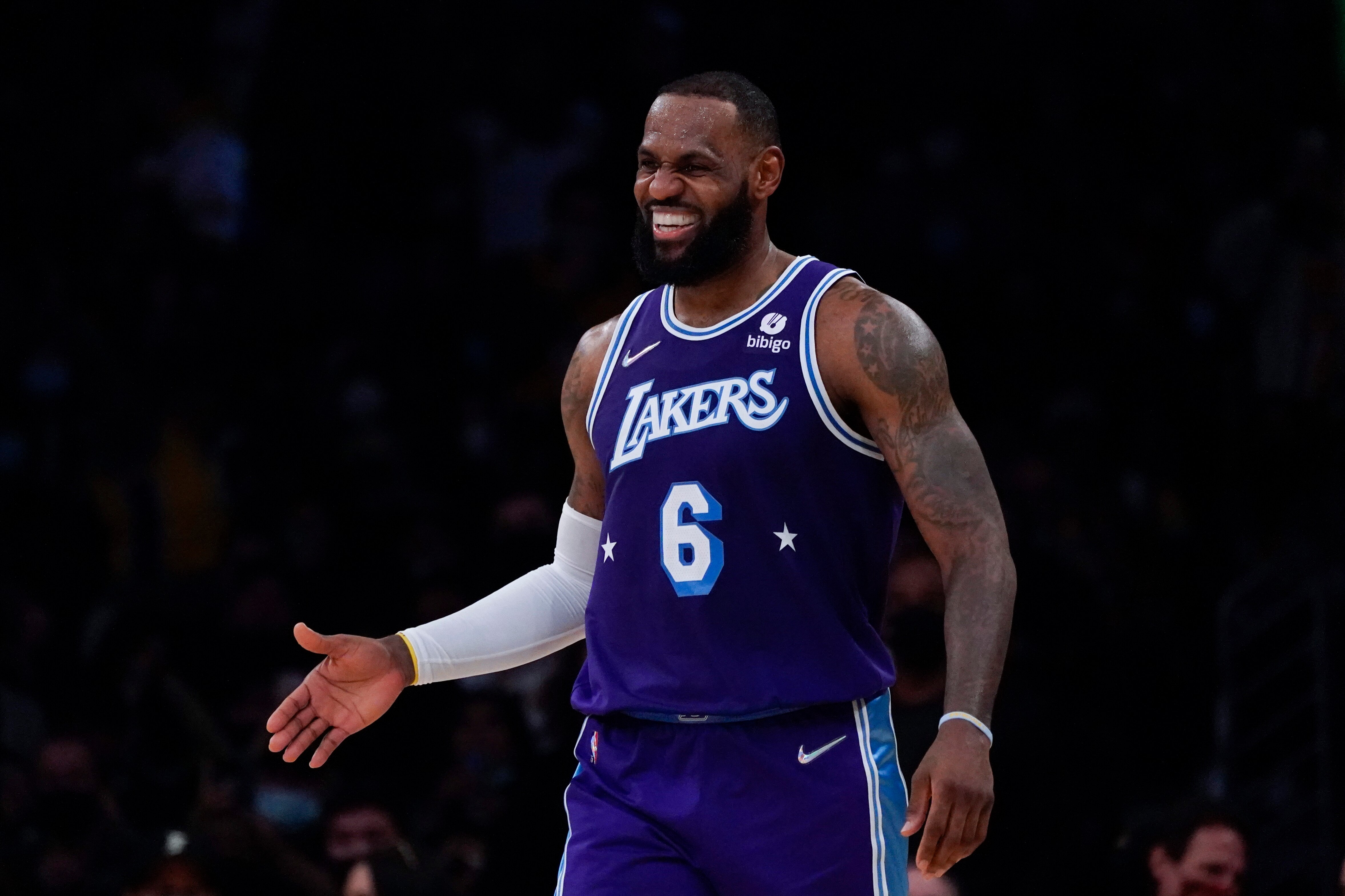 Los Angeles Lakers forward LeBron James (6) celebrates after scoring during an NBA basketball game against the Atlanta Hawks in Los Angeles, Friday, Jan. 7, 2022. (AP Photo/Ashley Landis)