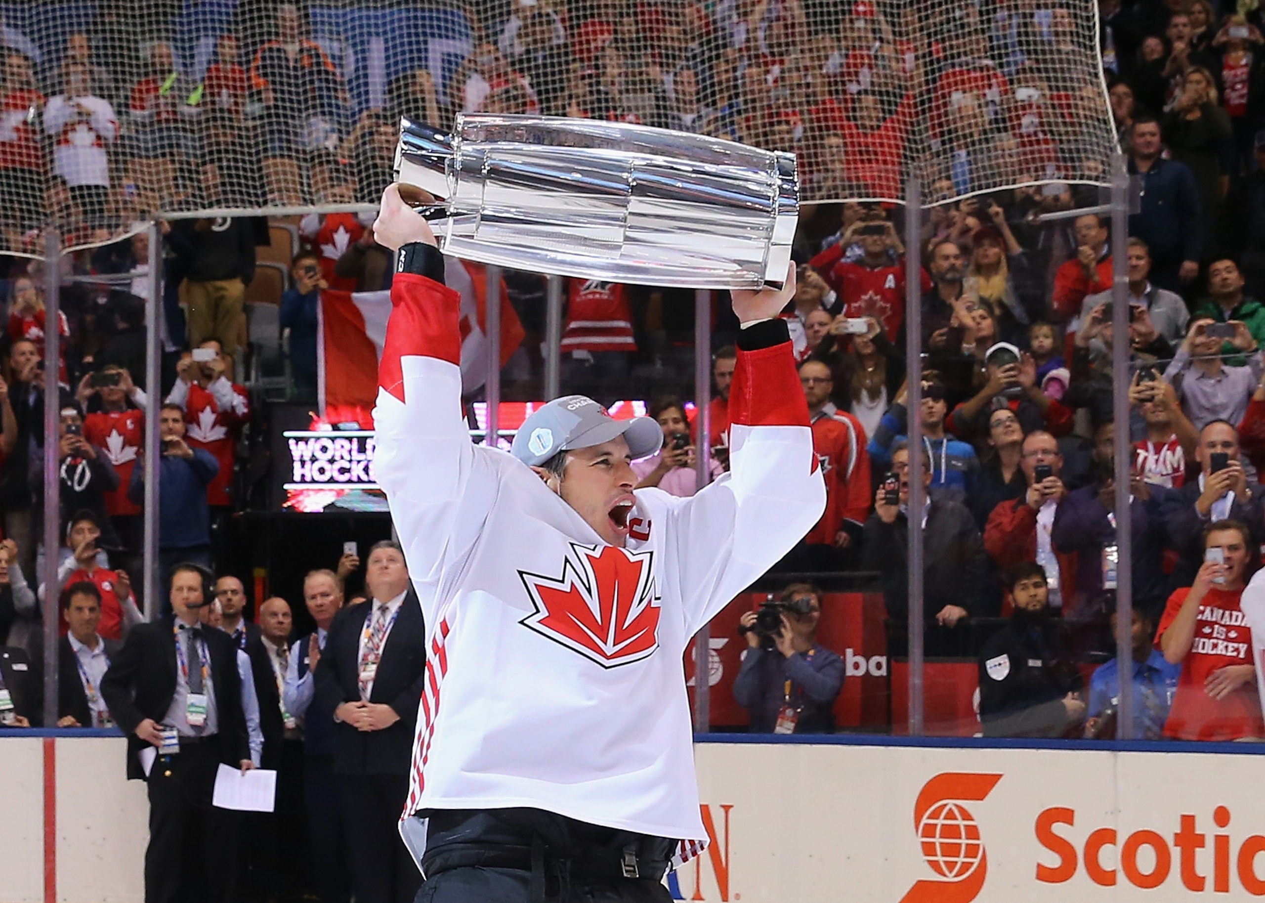 TORONTO, ON - SEPTEMBER 29:  Sidney Crosby #87 of Team Canada carries the World Cup of Hockey Trophy after Canada defeated Europe 2-1 during Game Two of the World Cup of Hockey final series at the Air Canada Centre on September 29, 2016 in Toronto, Canada.  (Photo by Bruce Bennett/Getty Images)