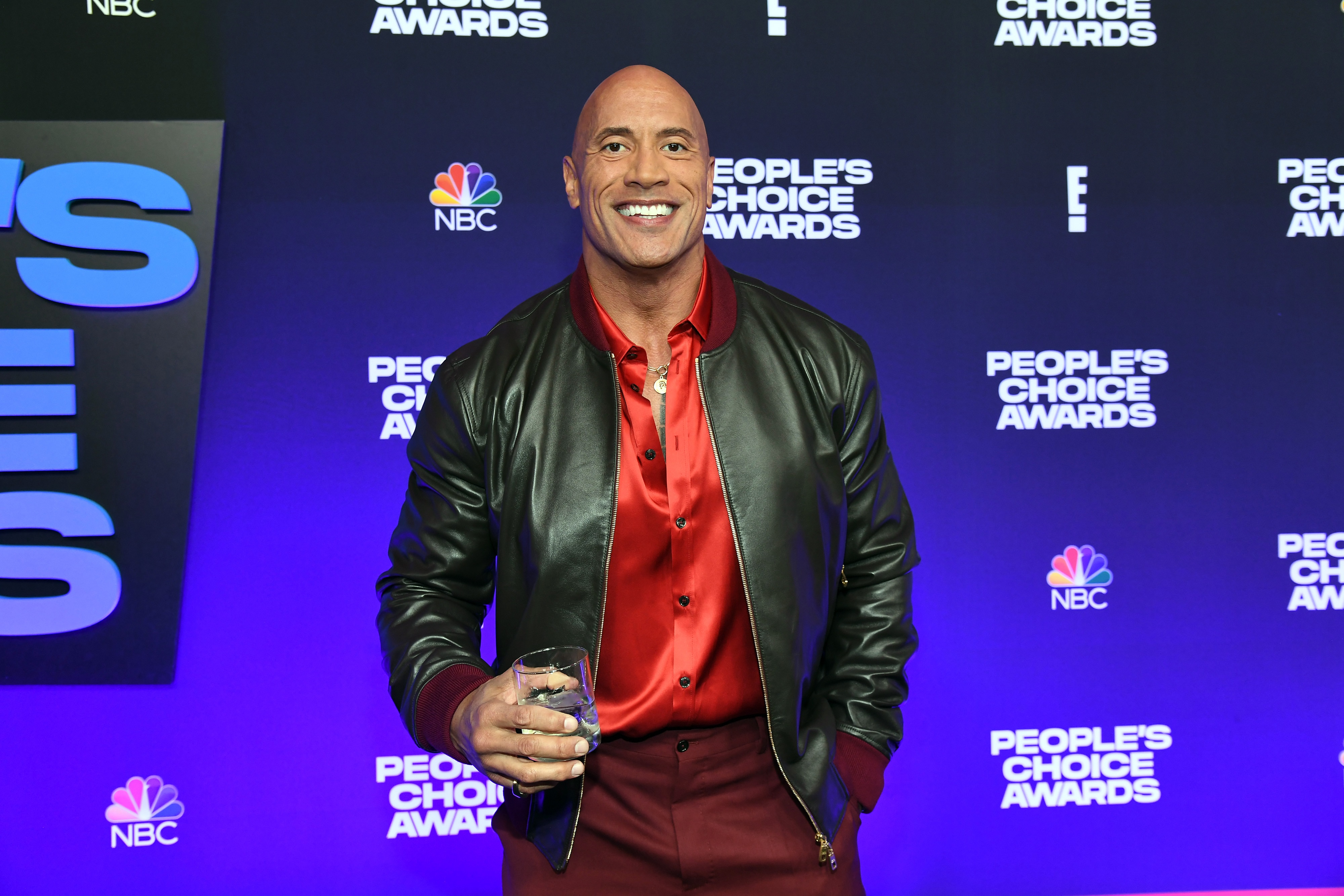 SANTA MONICA, CALIFORNIA - DECEMBER 07: Dwayne Johnson attends the People's Choice Awards at Barker Hangar on December 07, 2021 in Santa Monica, California. (Photo by Kevin Mazur/Getty Images for DJ)