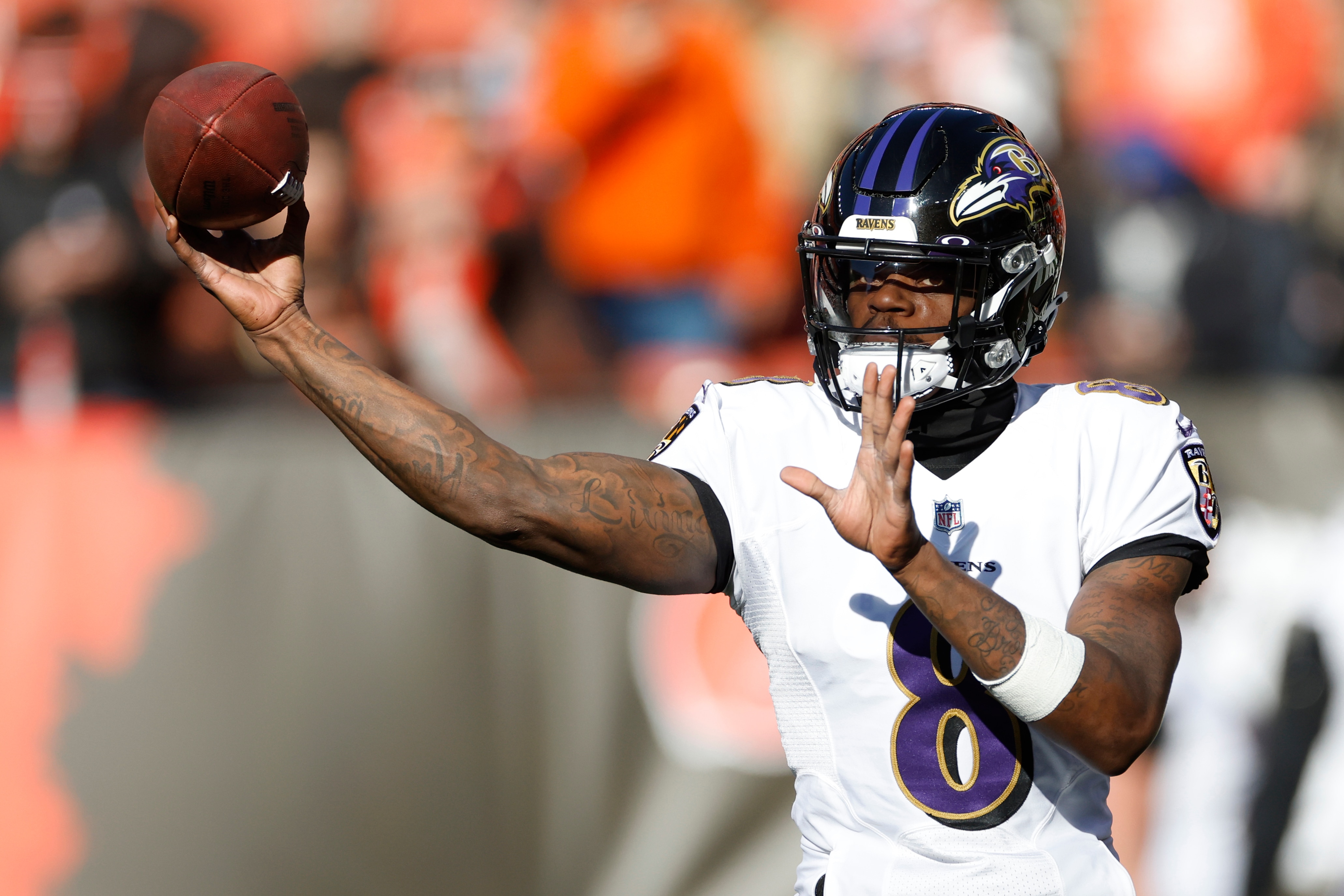 Baltimore Ravens quarterback Lamar Jackson warms up before an NFL football game against the Cleveland Browns, Sunday, Dec. 12, 2021, in Cleveland. (AP Photo/Ron Schwane)