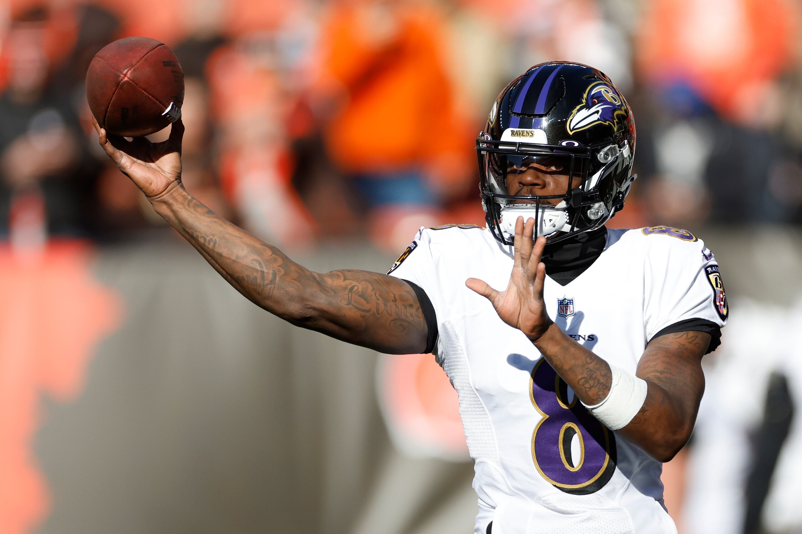 Baltimore Ravens quarterback Lamar Jackson warms up before an NFL football game against the Cleveland Browns, Sunday, Dec. 12, 2021, in Cleveland. (AP Photo/Ron Schwane)