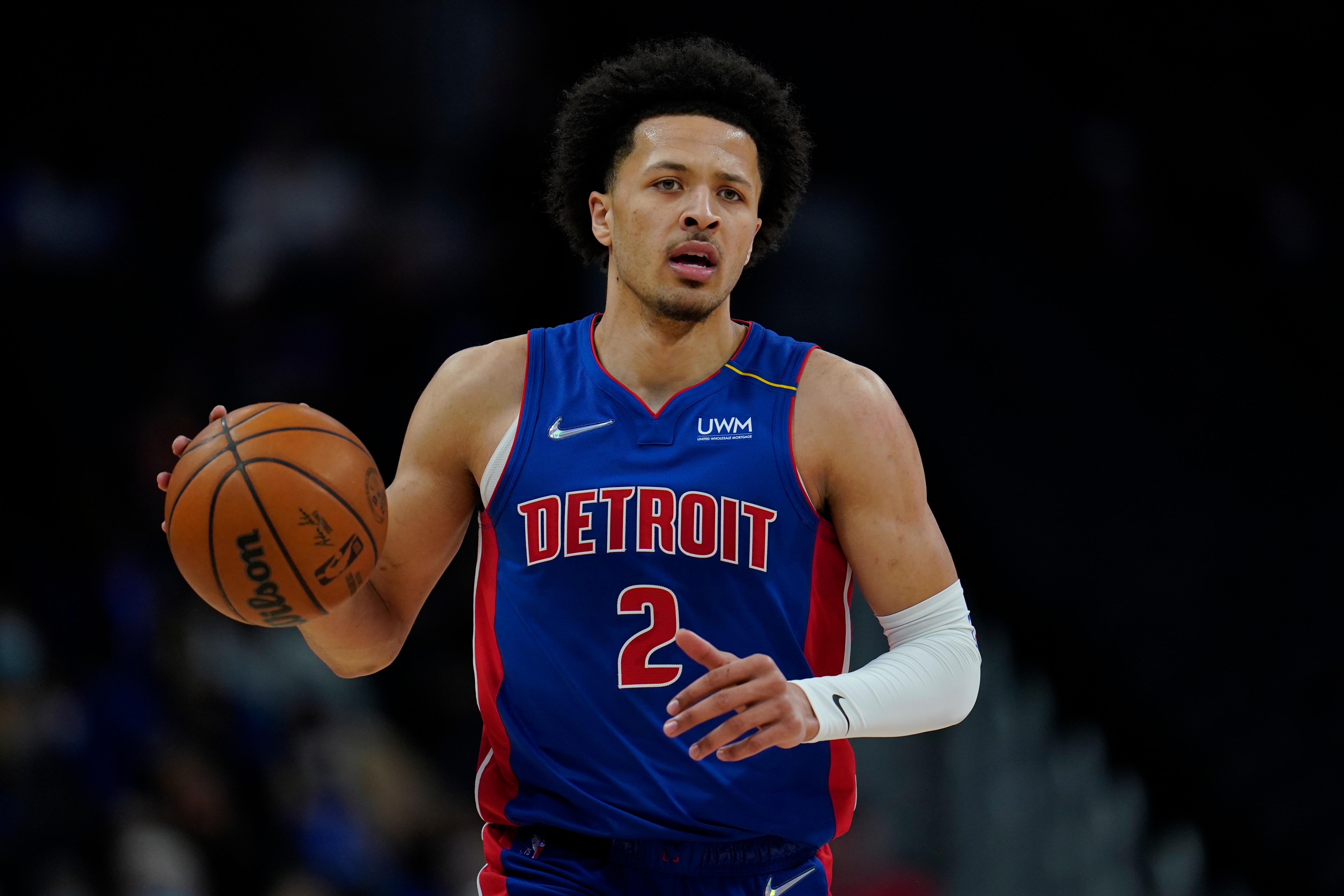Detroit Pistons guard Cade Cunningham plays against the New Orleans Pelicans in the first half of an NBA basketball game in Detroit, Tuesday, Feb. 1, 2022. (AP Photo/Paul Sancya)