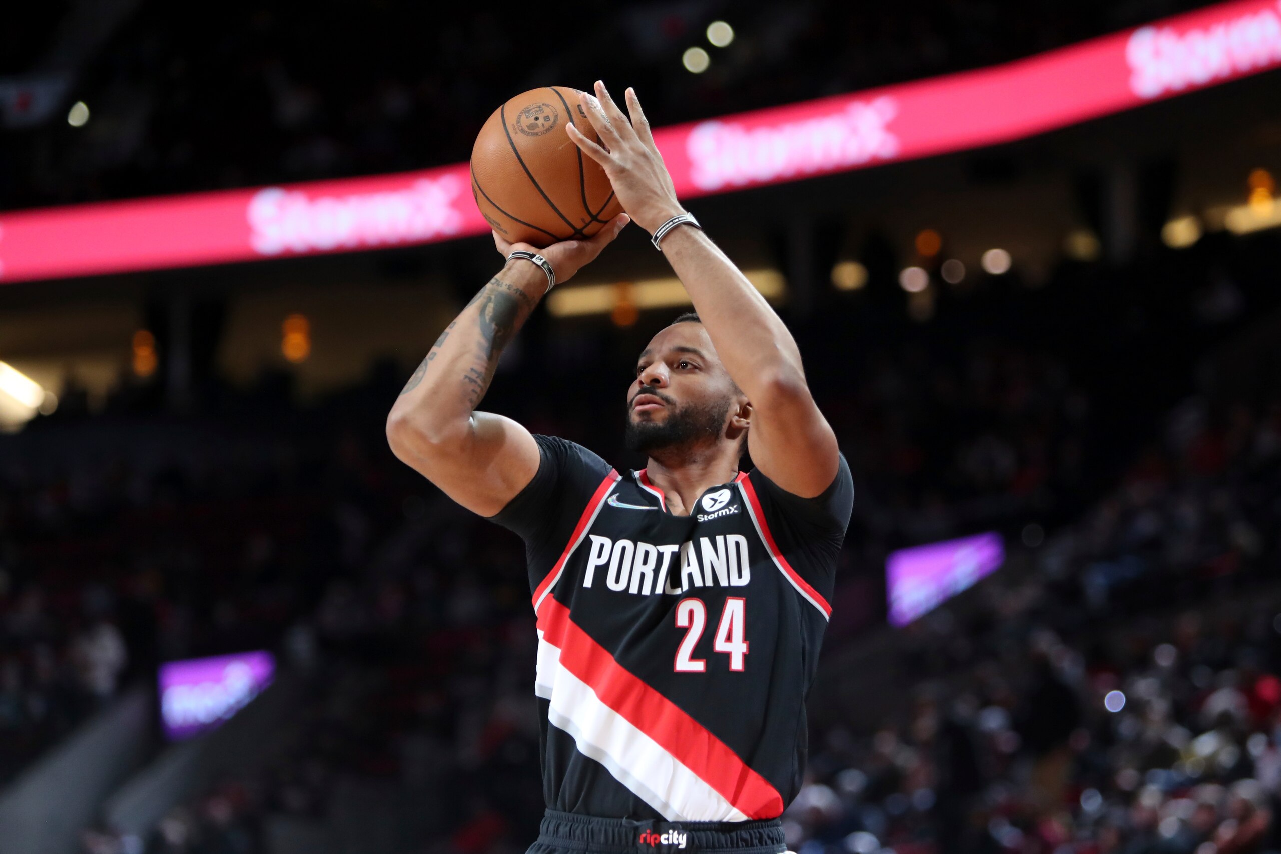 Portland Trail Blazers forward Norman Powell shoots against the Dallas Mavericks during the first half of an NBA basketball game in Portland, Ore., Monday, Dec. 27, 2021. (AP Photo/Amanda Loman)